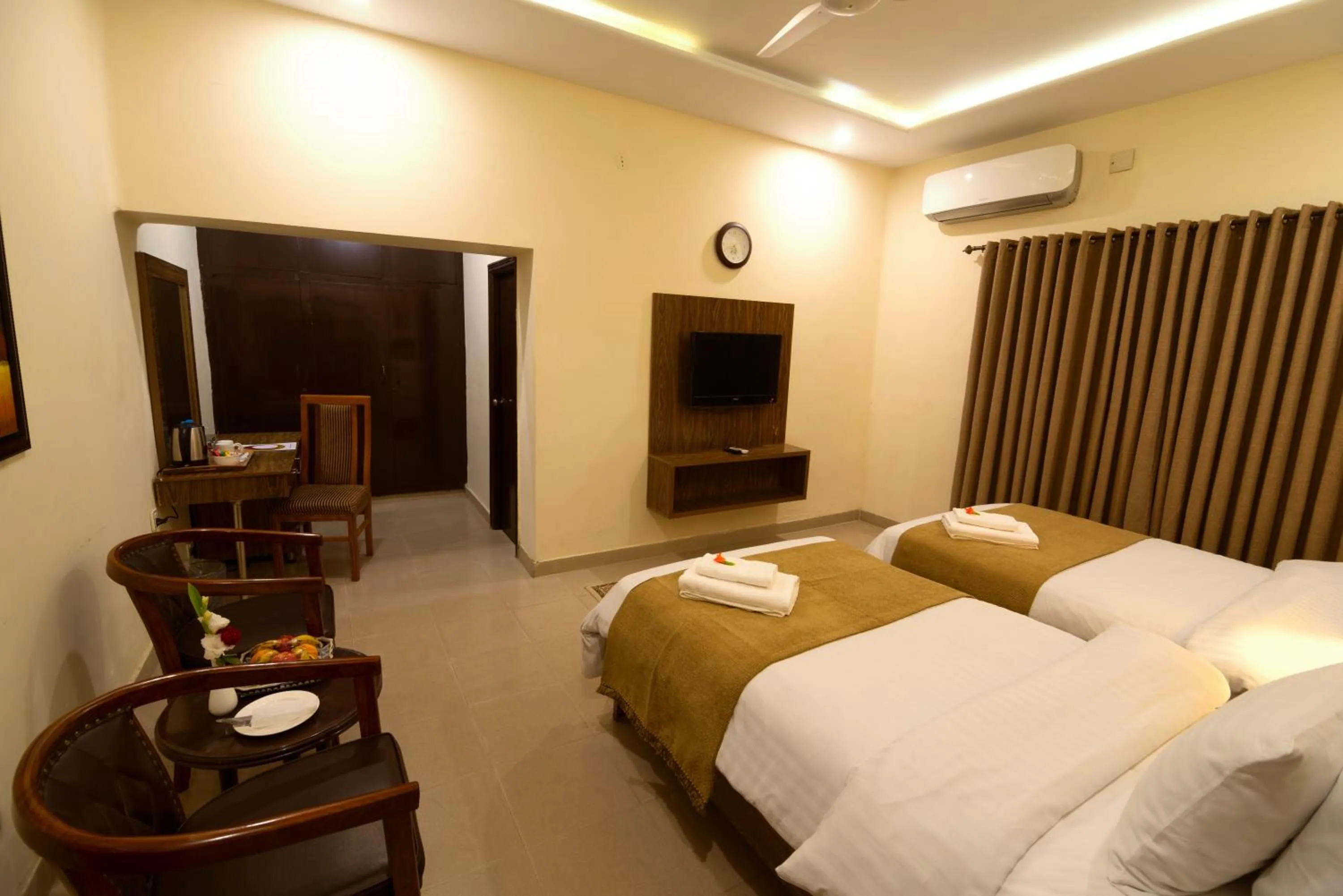 Photo of the whole room, Bed in Hotel One Lalazar Multan