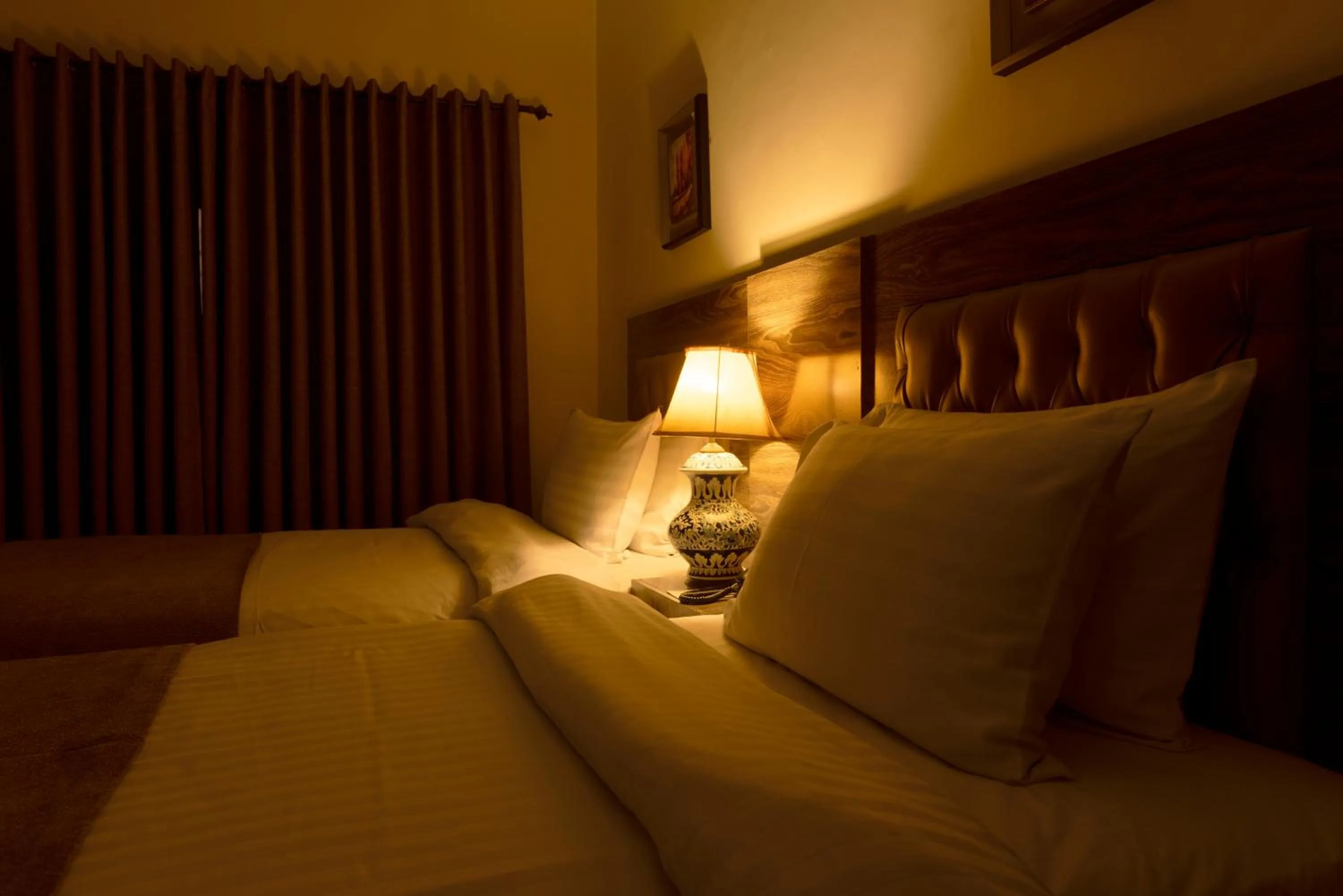 Bed in Hotel One Lalazar Multan