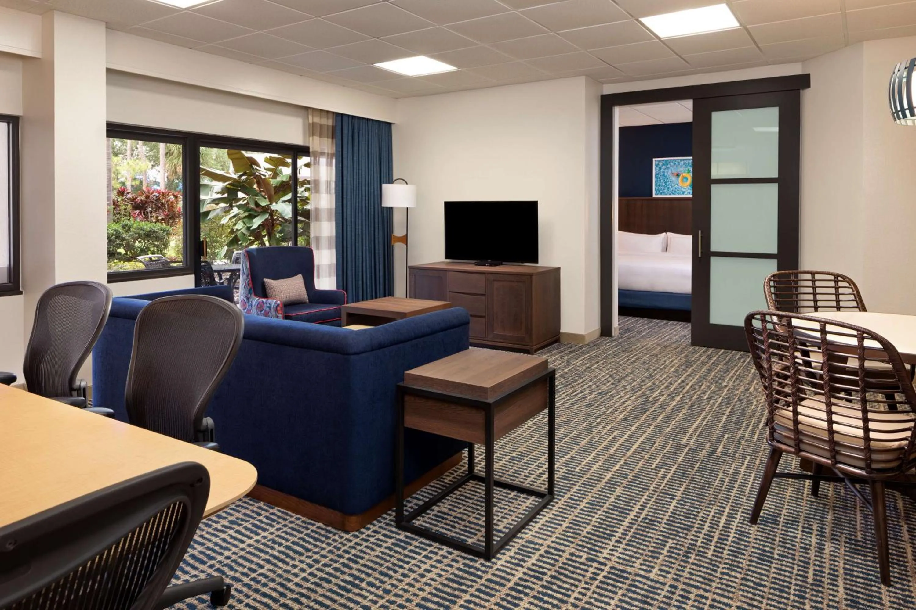 Bedroom in DoubleTree Suites by Hilton Orlando at Disney Springs
