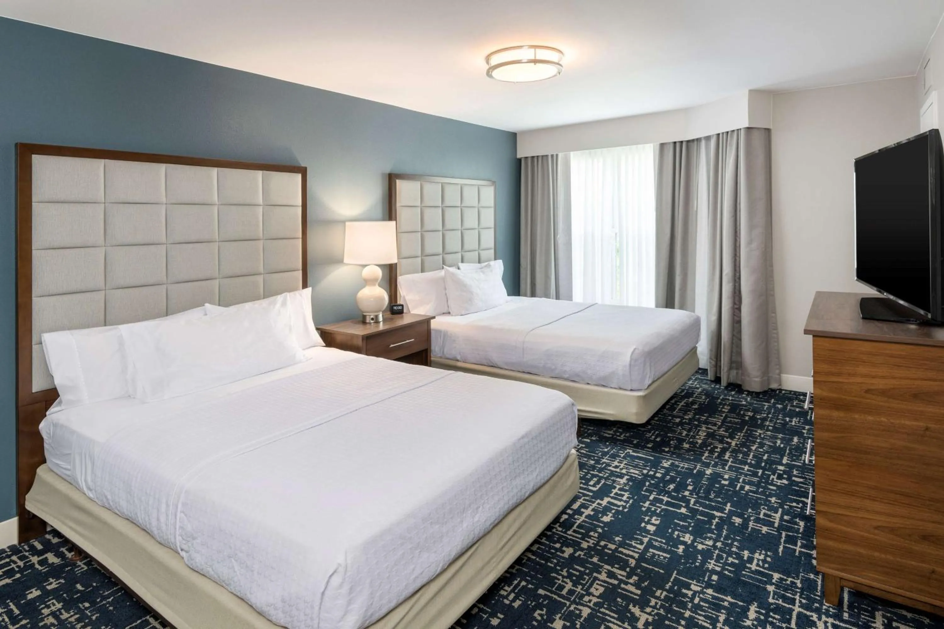 Bed in Homewood Suites by Hilton Mount Laurel