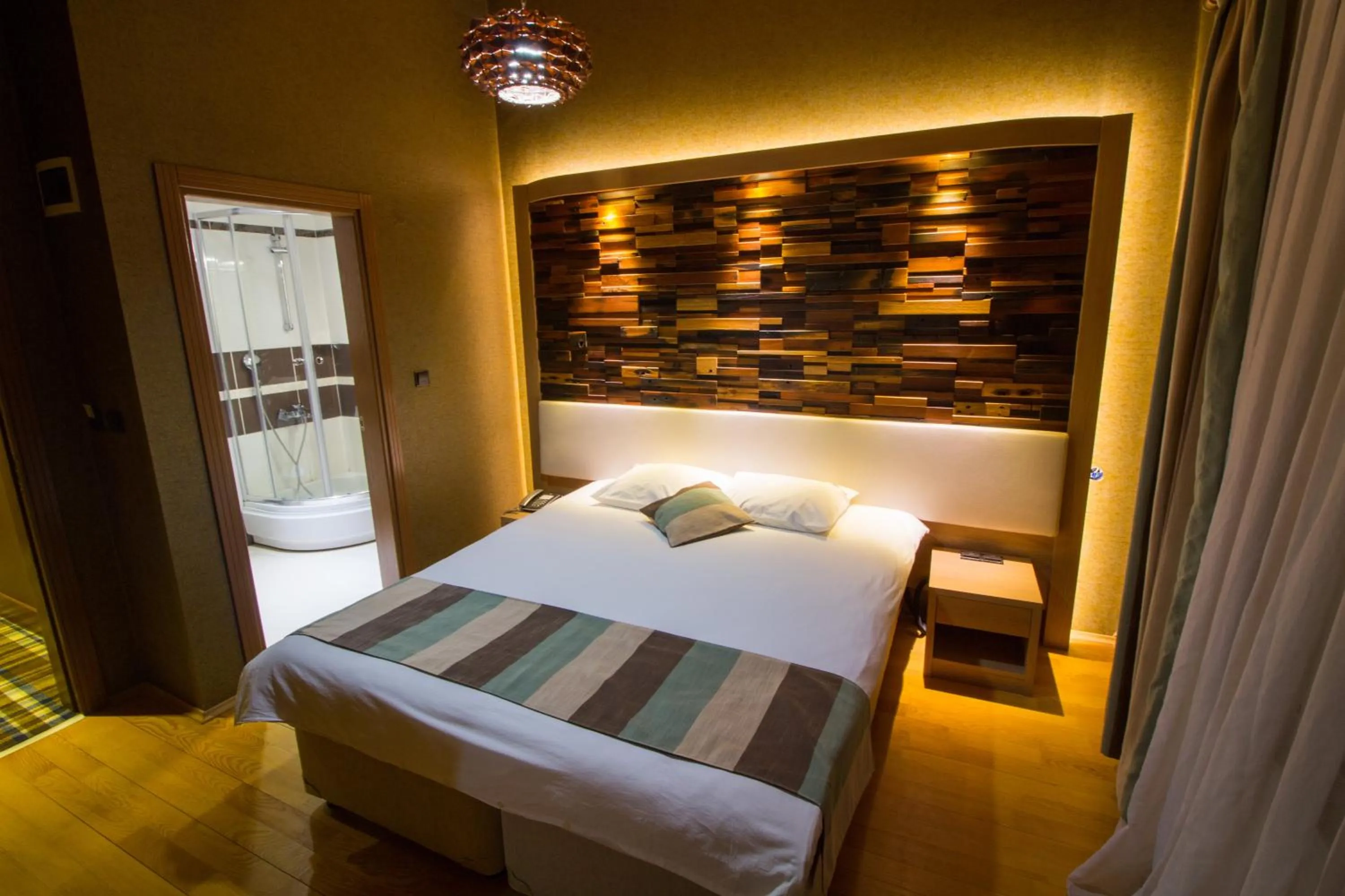 Bed in Ayderoom Hotel