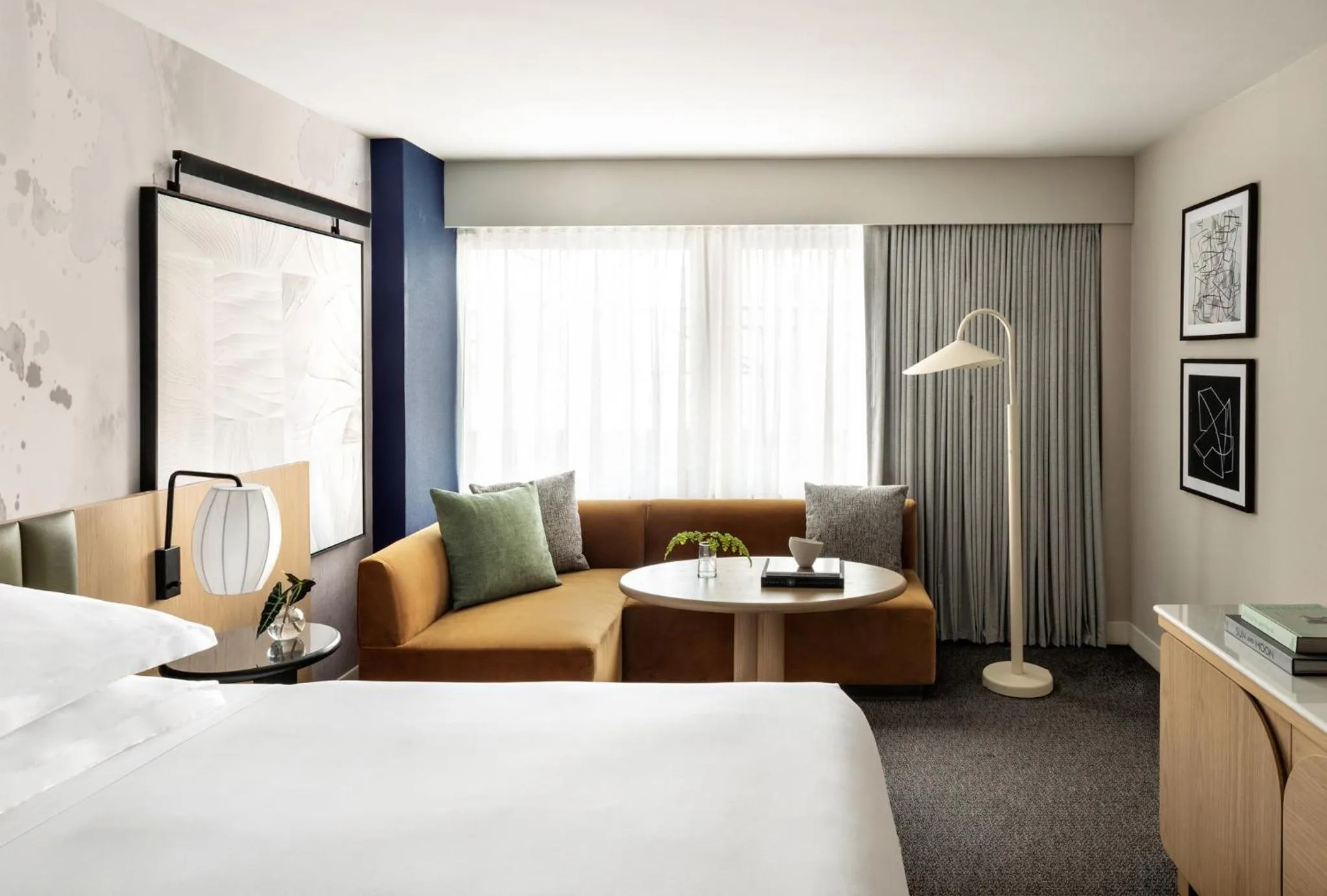 Photo of the whole room, Bed in Kimpton Theta New York - Times Square by IHG