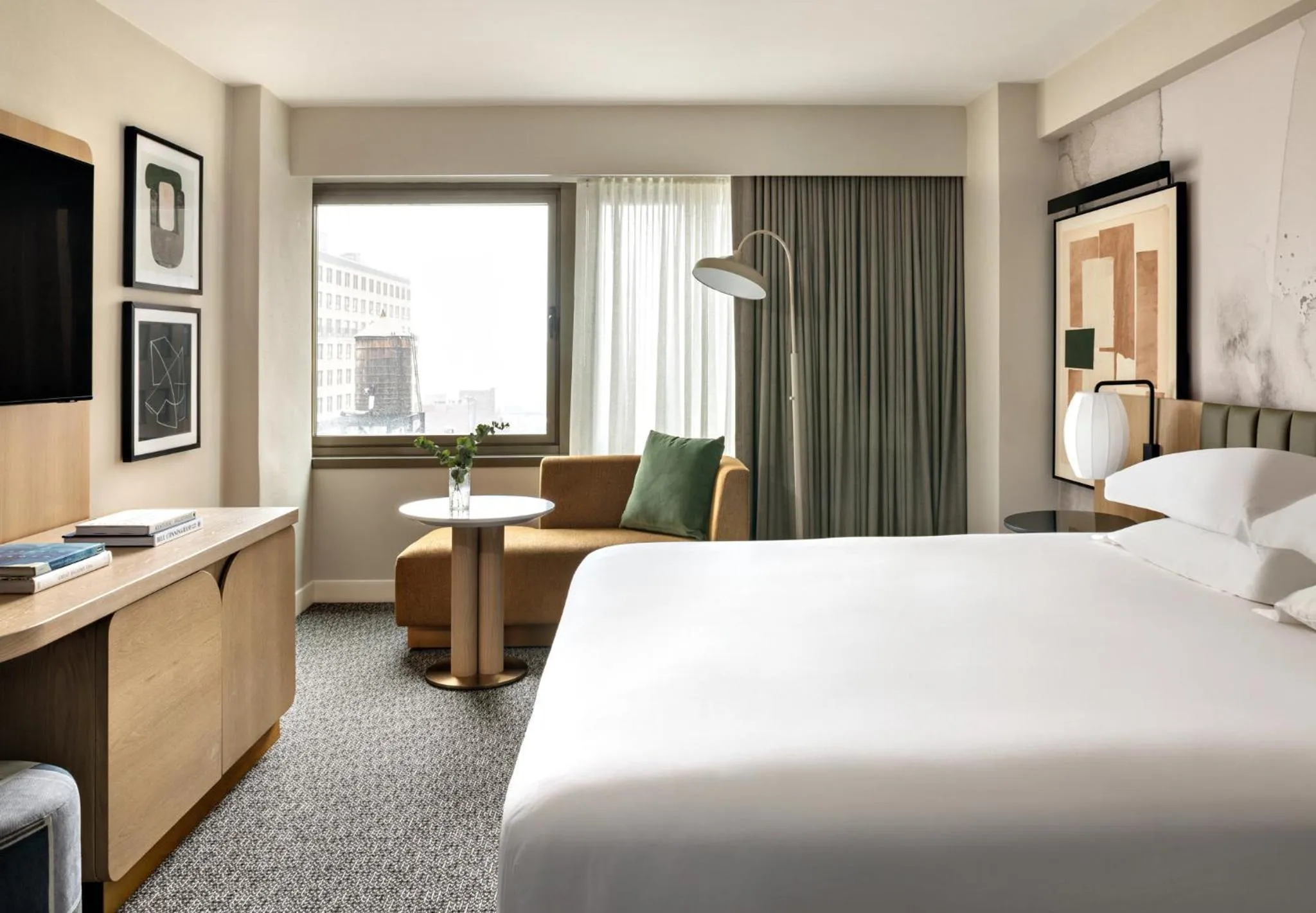 Photo of the whole room, Bed in Kimpton Theta New York - Times Square by IHG