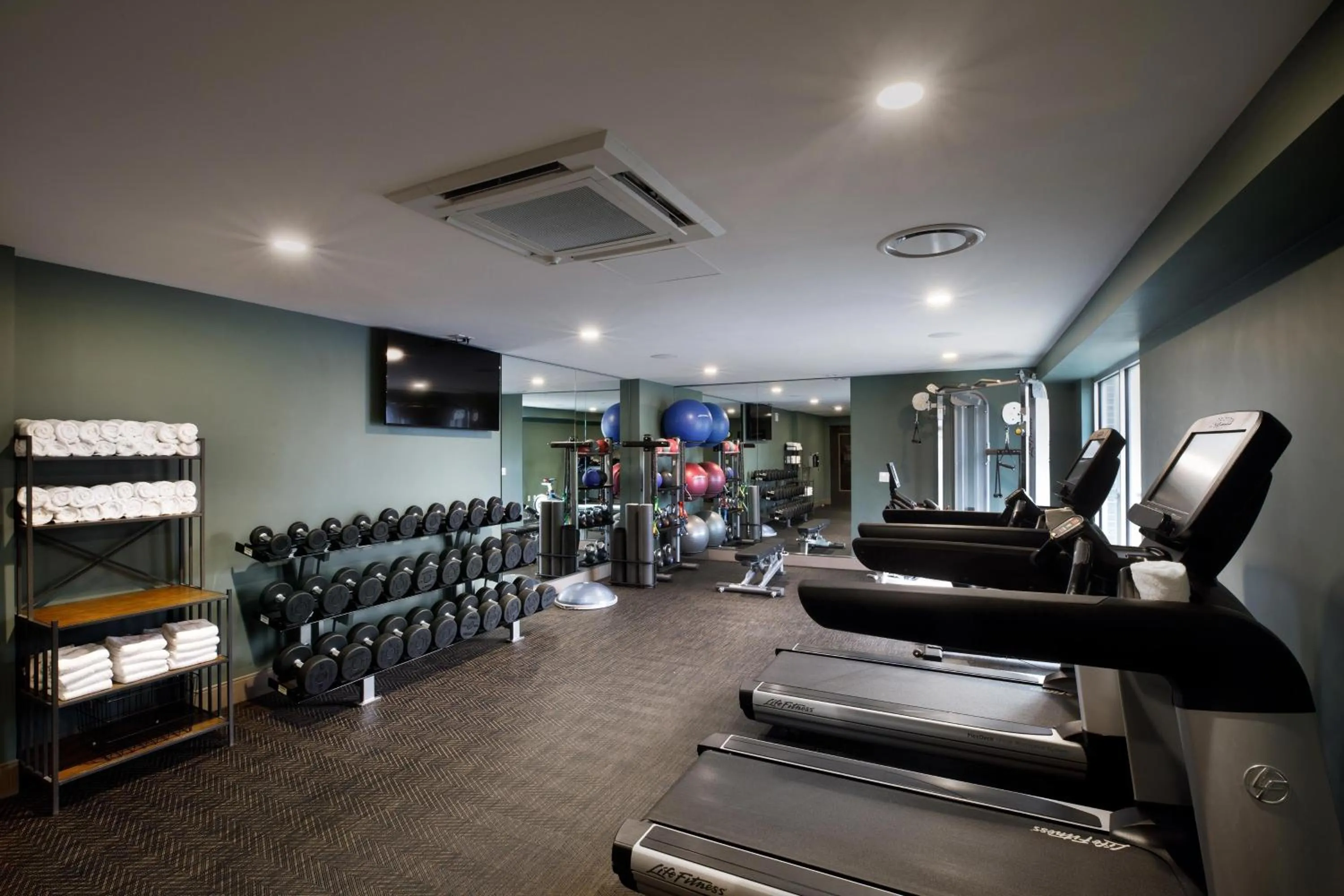 Fitness centre/facilities in Cyrus Hotel, Topeka, a Tribute Portfolio Hotel