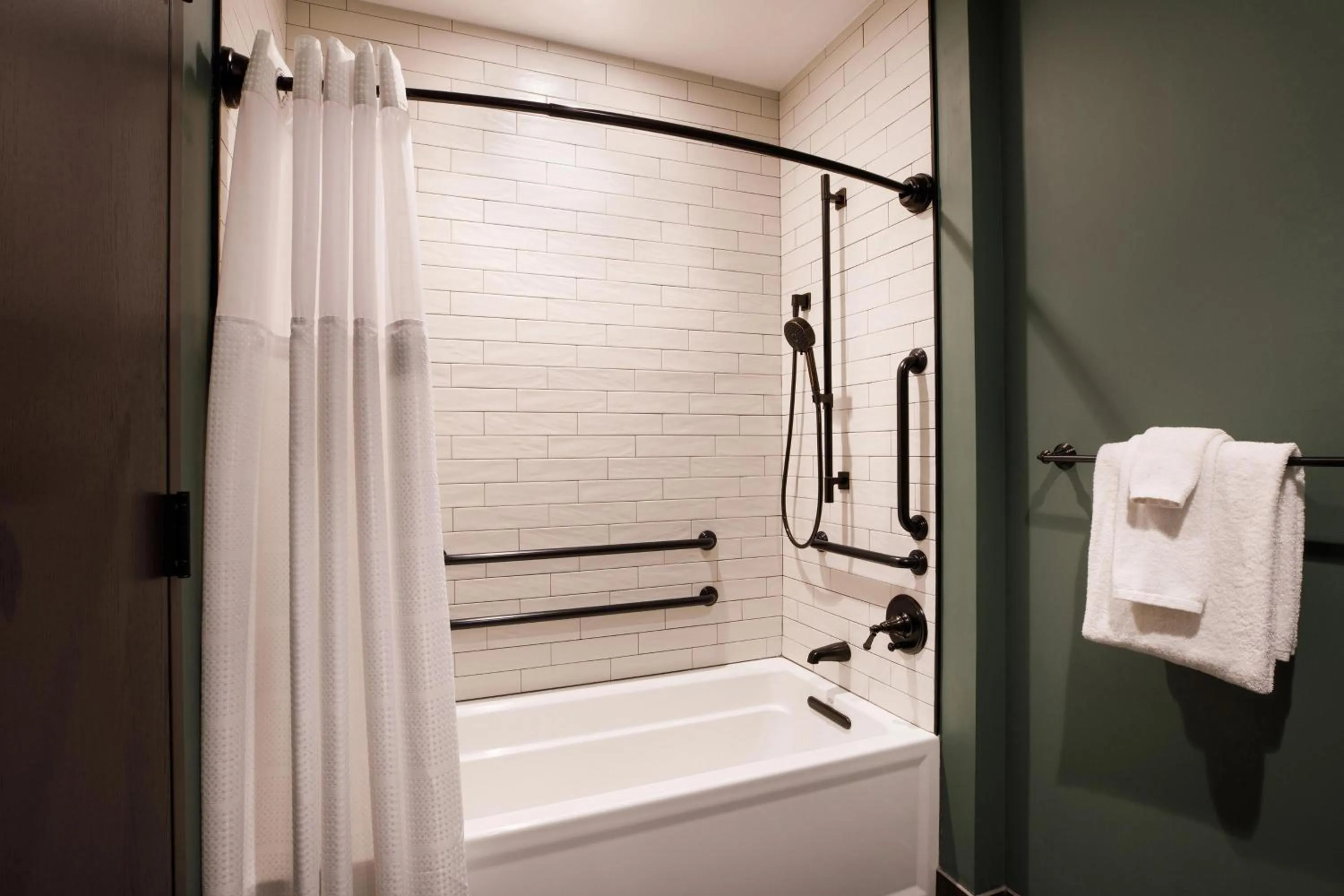 Bathroom in Cyrus Hotel, Topeka, a Tribute Portfolio Hotel