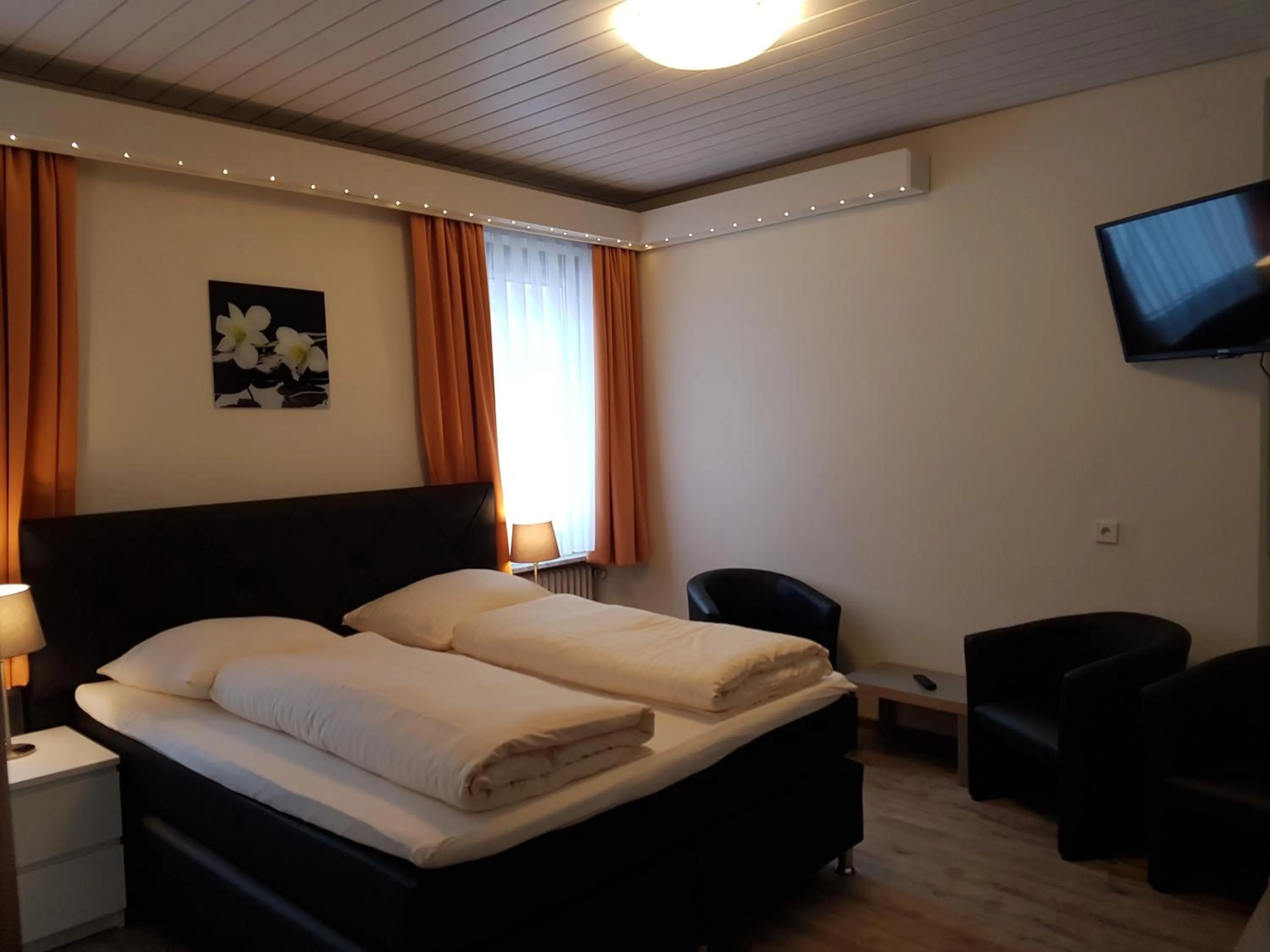 Photo of the whole room, Bed in Hotel Restaurant Ketterer am Kurgarten