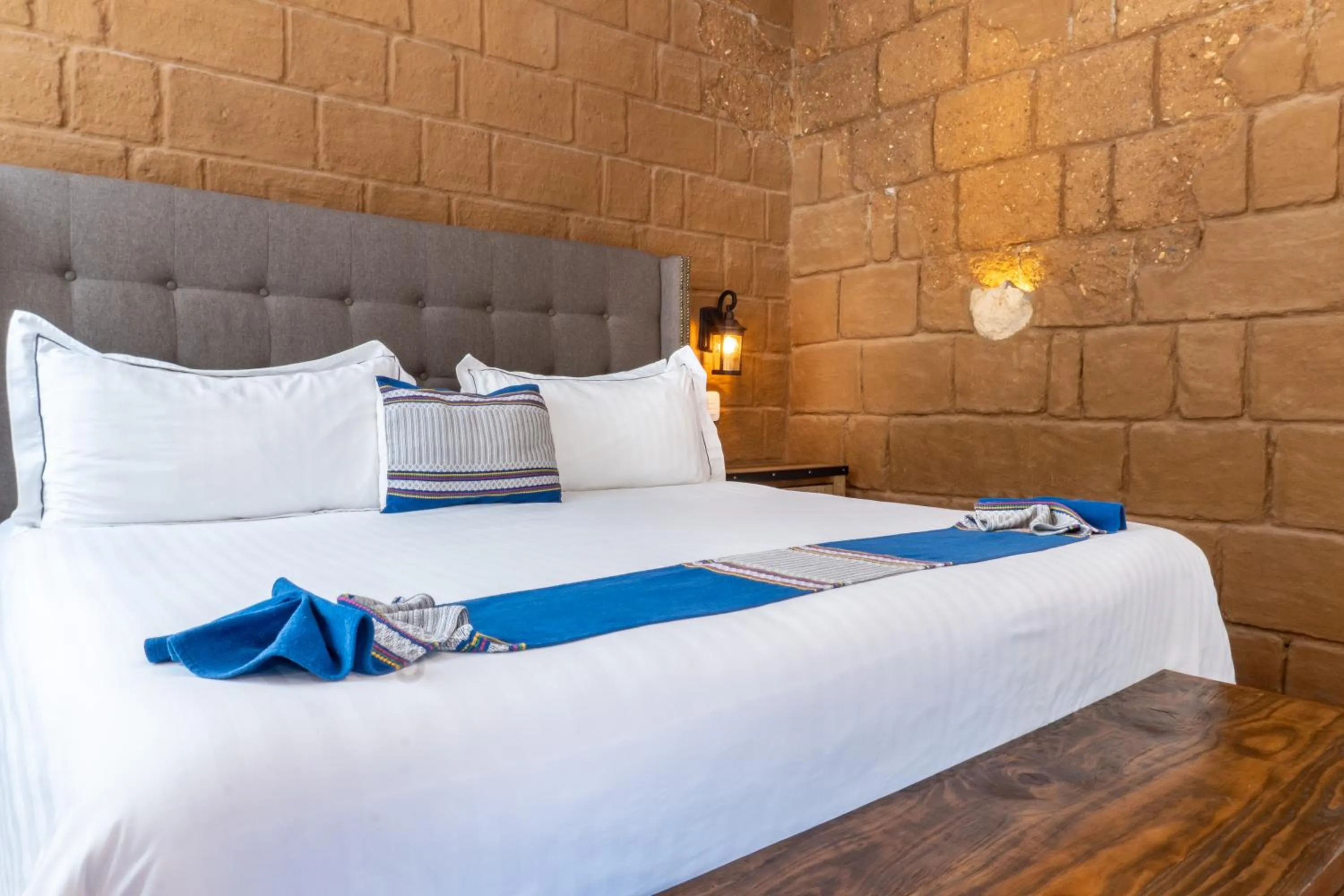 Bed in Casa de Adobe Gallery & Luxury Boutique