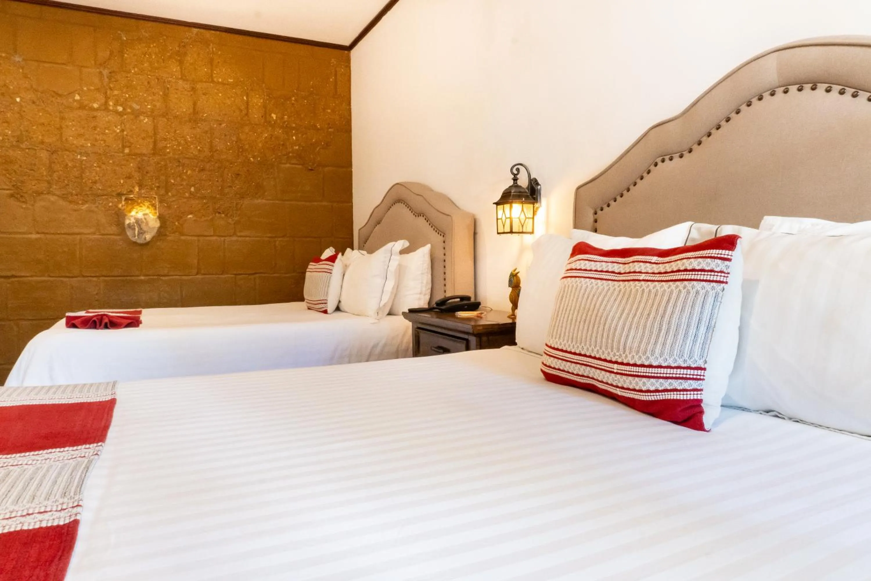 Bed in Casa de Adobe Gallery & Luxury Boutique