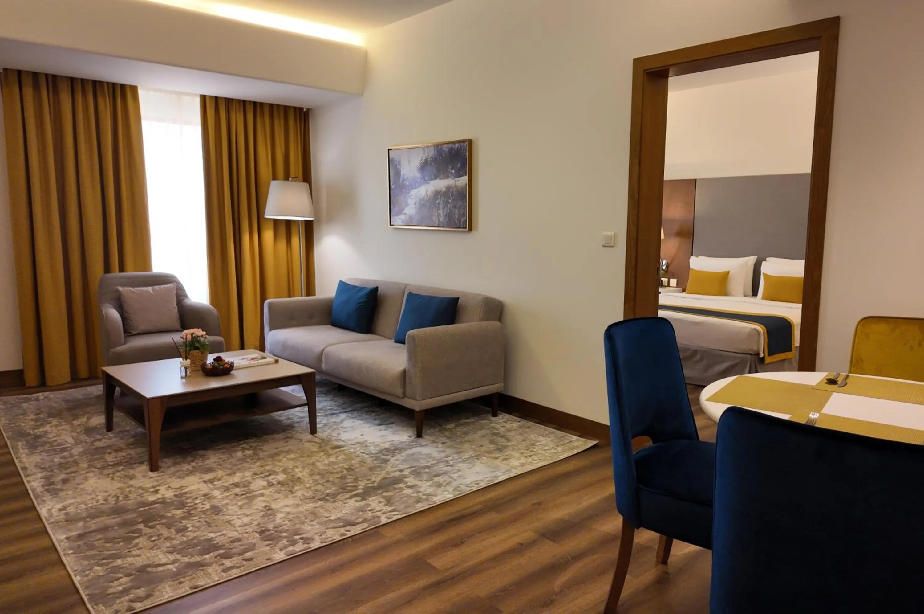 Living room, Bed in Golden Tulip Muscat