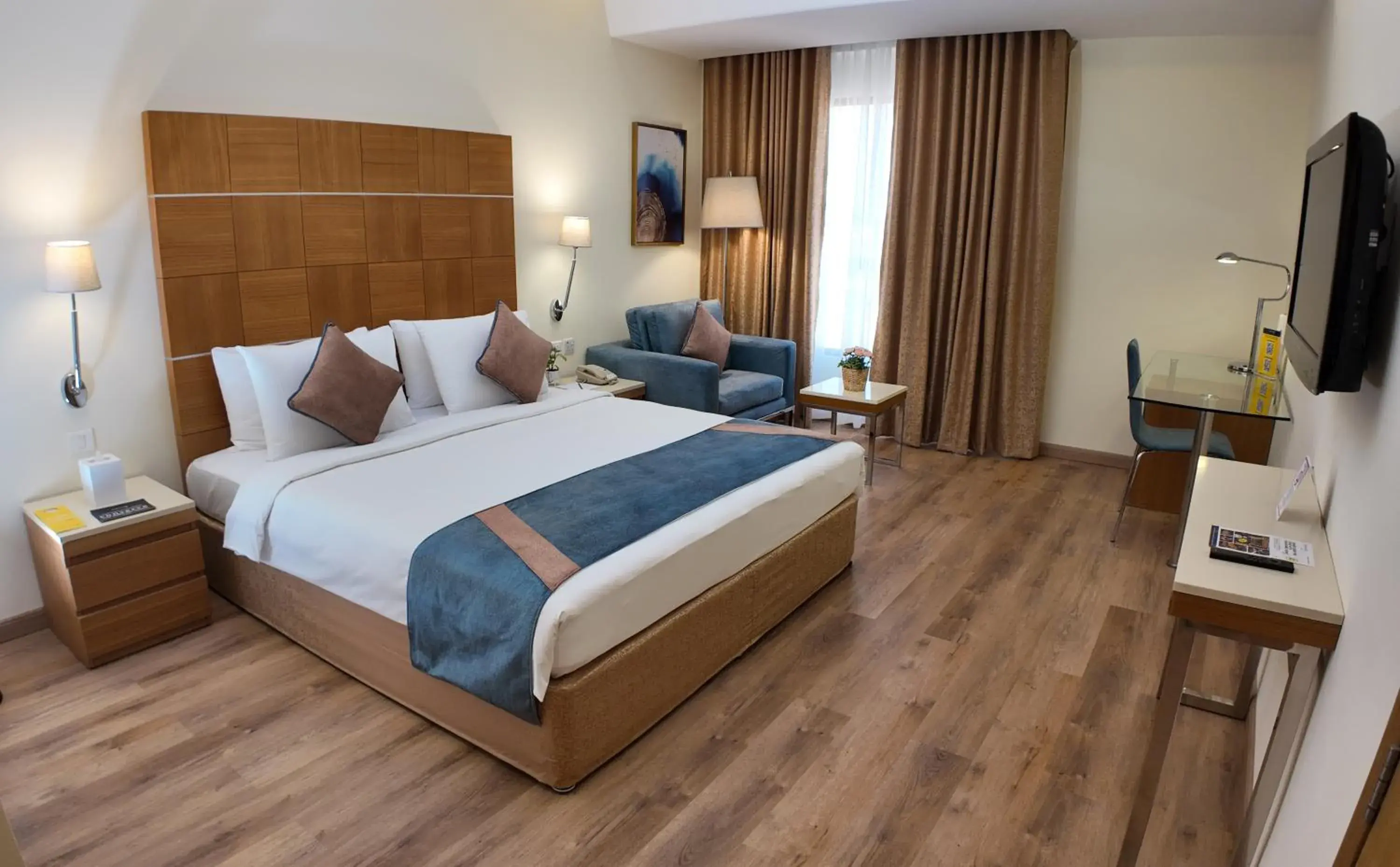 Standard Room King Bed in Golden Tulip Muscat Standard Room King Bed in Golden Tulip Muscat