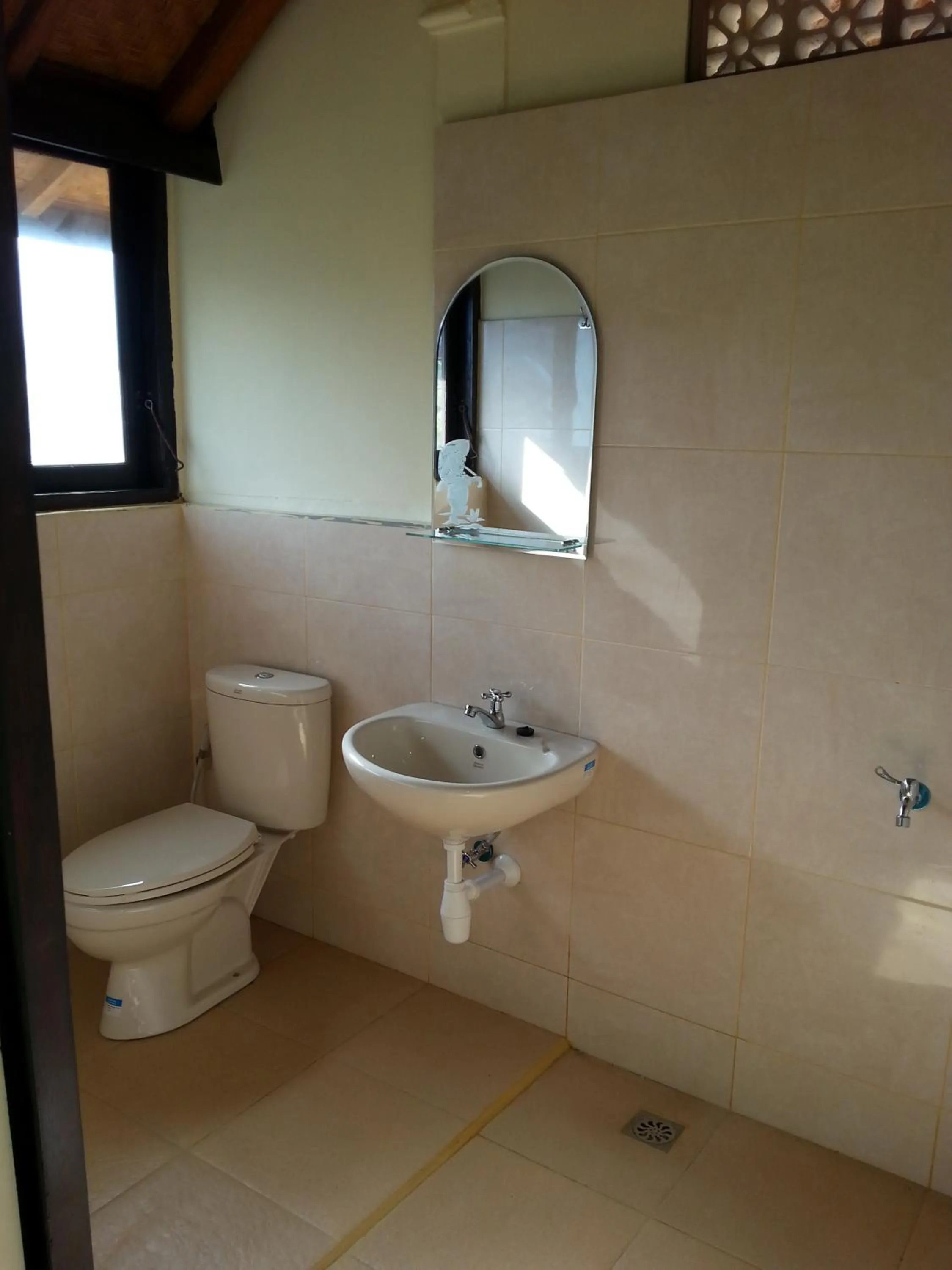 Bathroom in Puri Mandhara Lovina