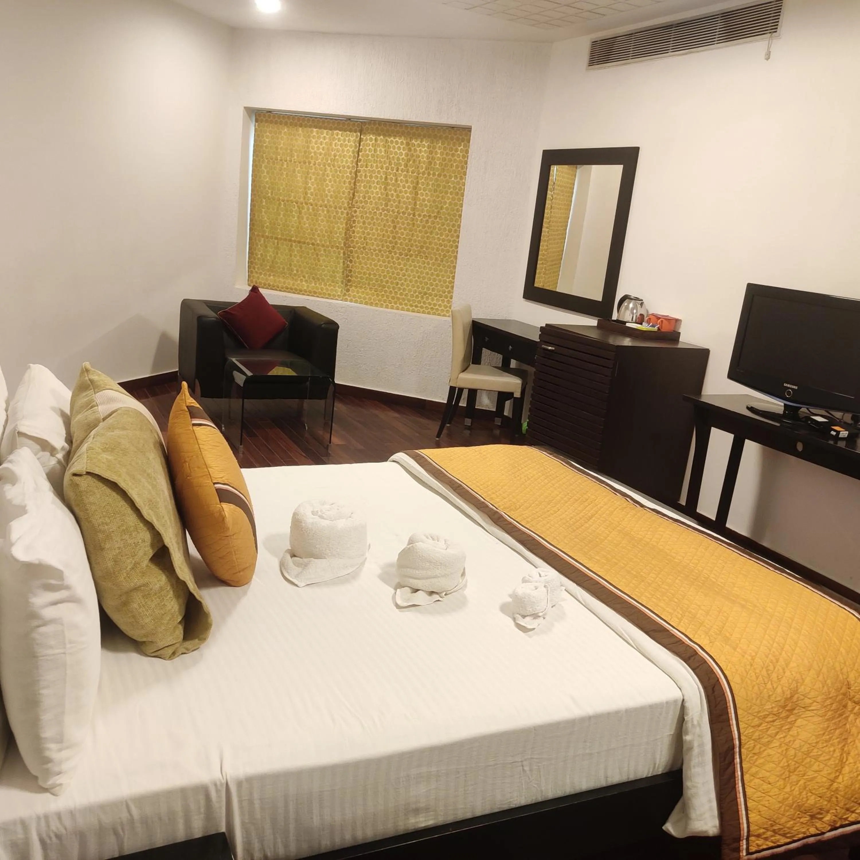 Bed in Vedic Village Sriperumbudur formerly known as Citrus Hotel