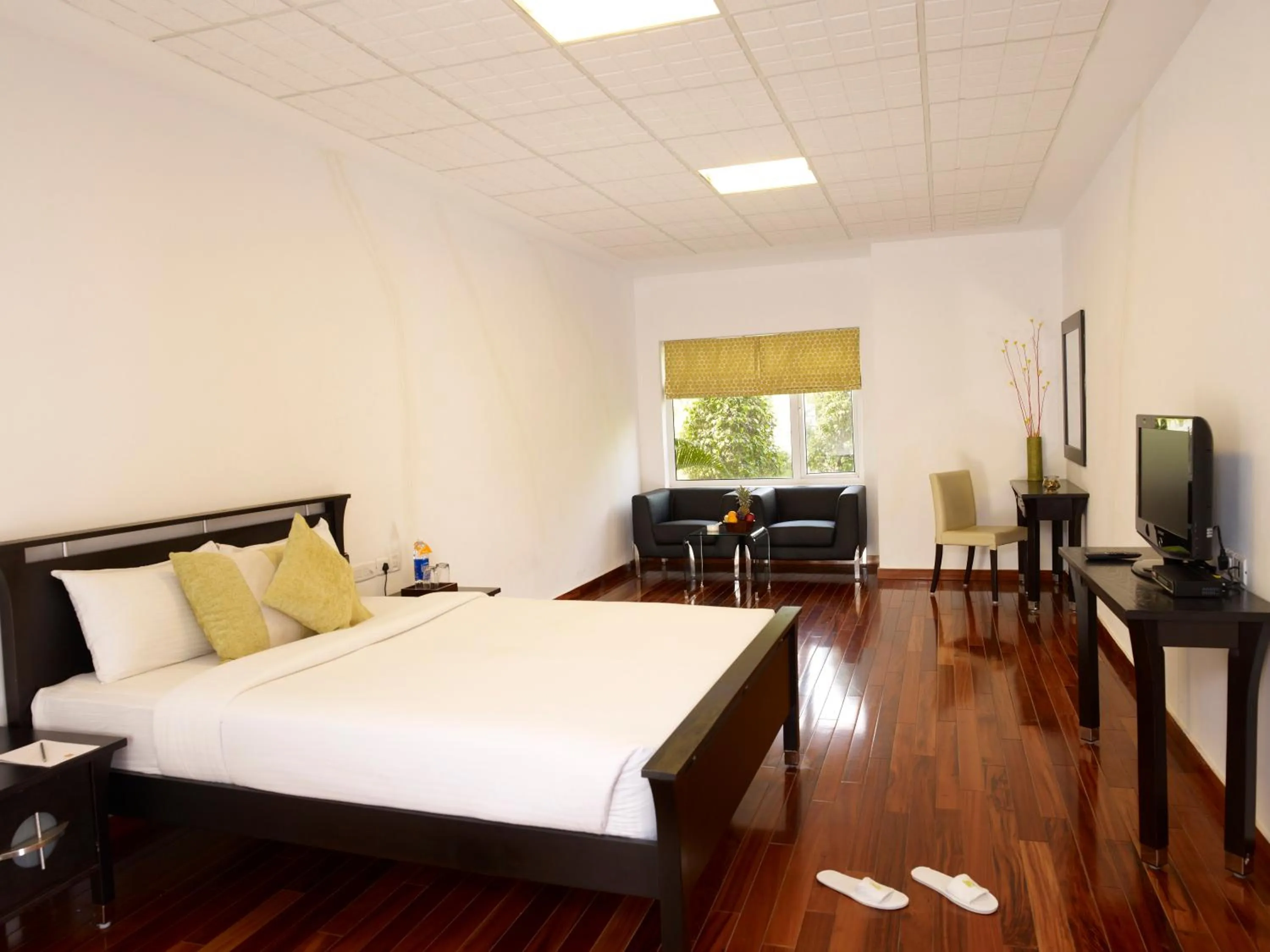 Photo of the whole room, Bed in Vedic Village Sriperumbudur formerly known as Citrus Hotel