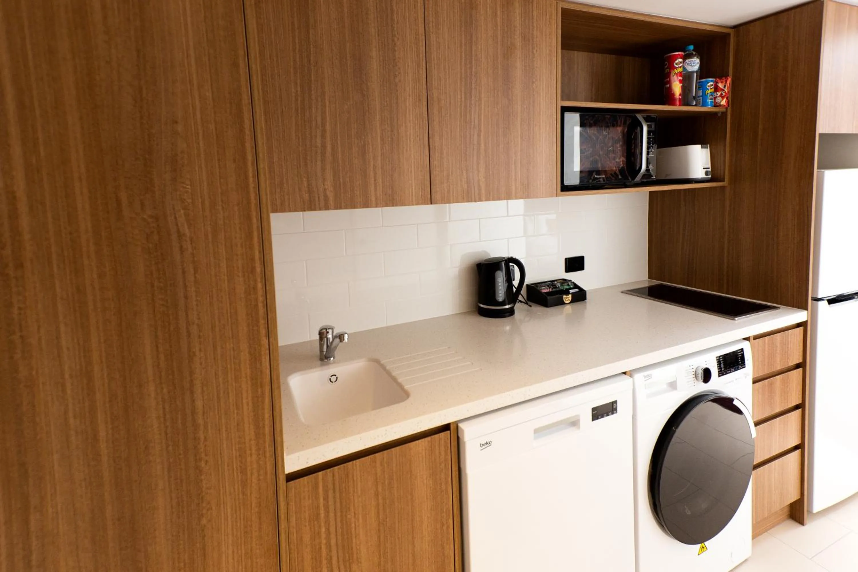 Kitchen or kitchenette in Mantra Gladstone