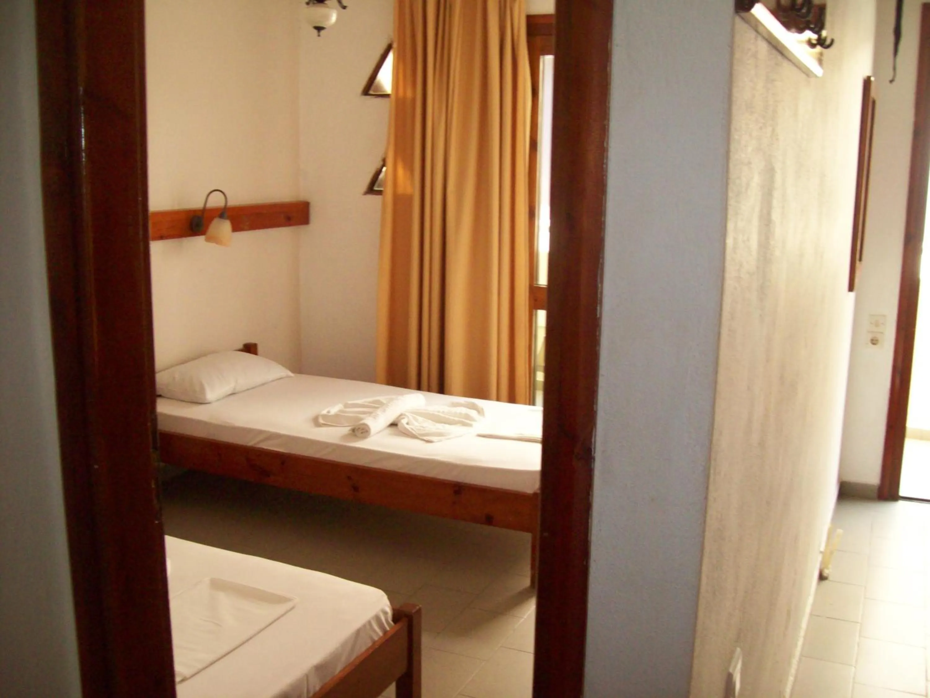 Bed, Bathroom in Kato Stalos Beach
