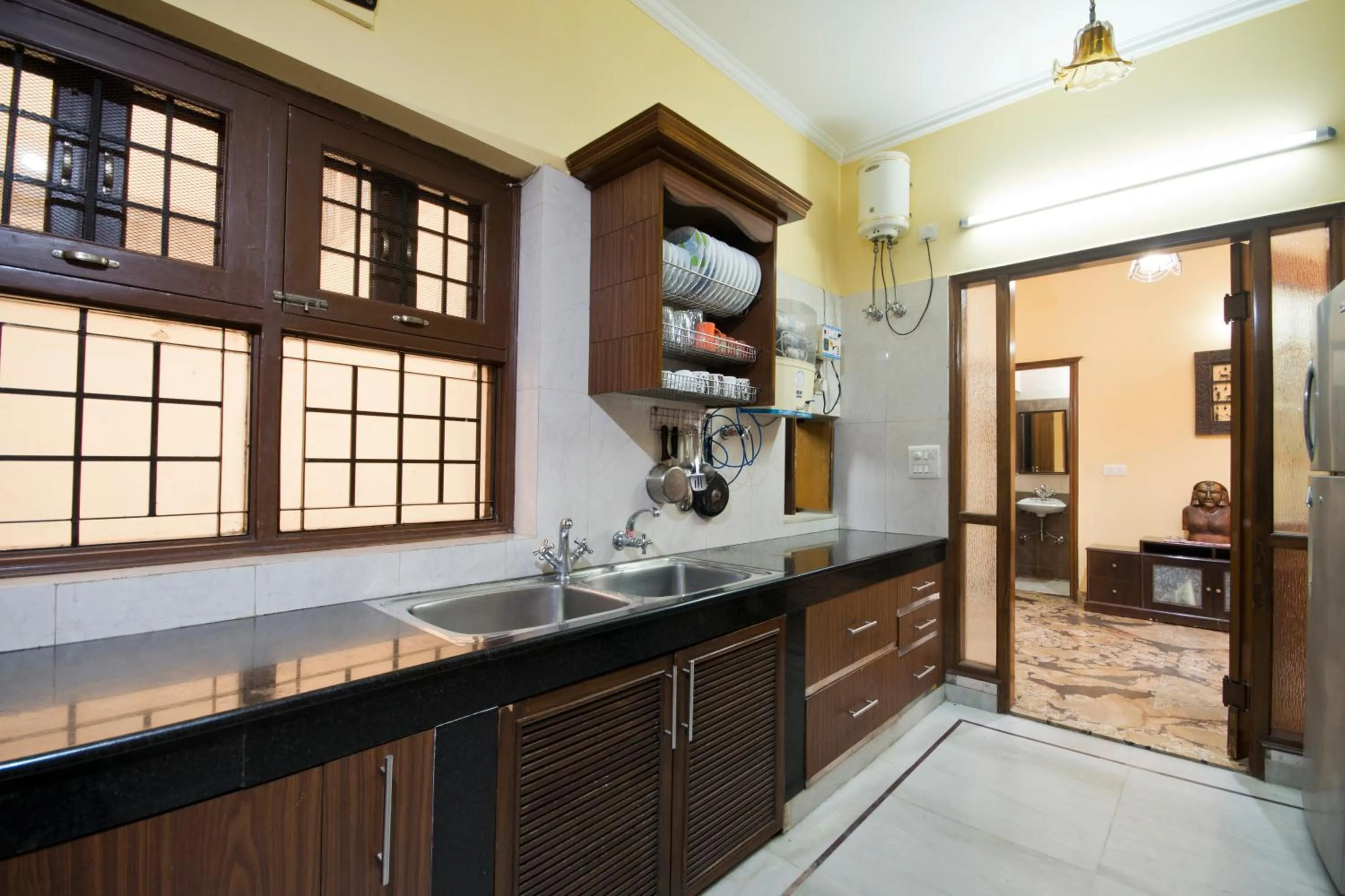 Communal kitchen in Prakash Kutir B&B