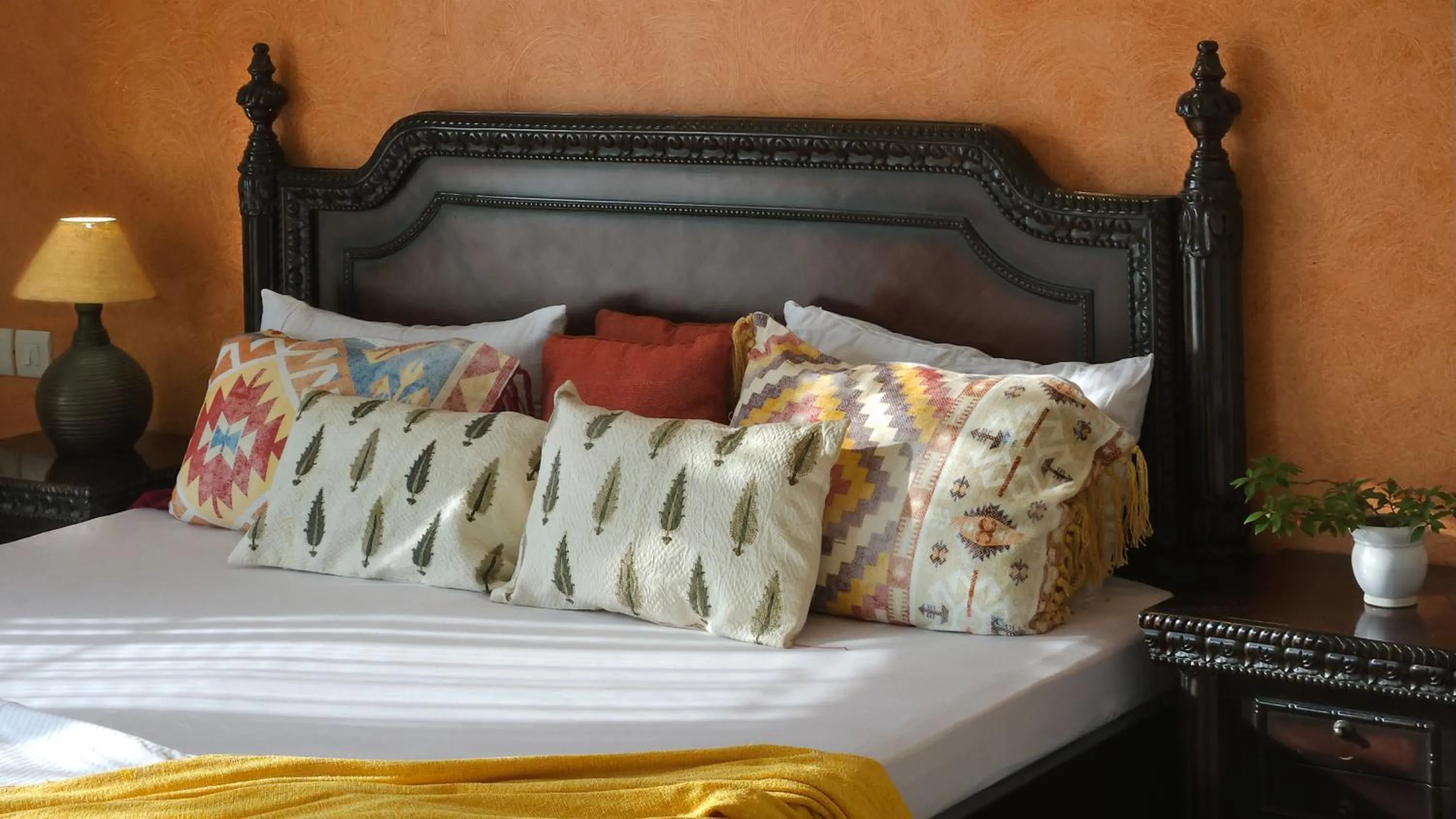 Bed in Prakash Kutir B&B