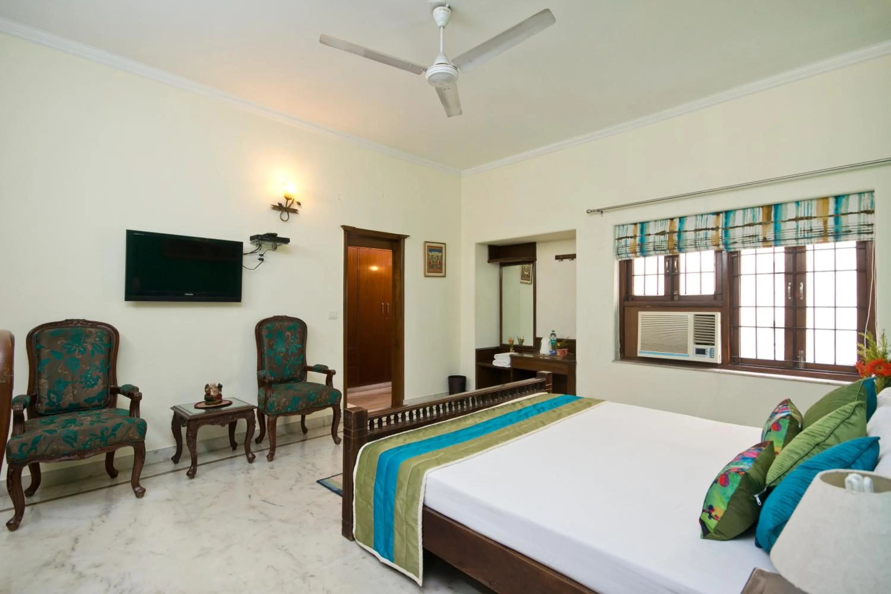 Bed in Prakash Kutir B&B