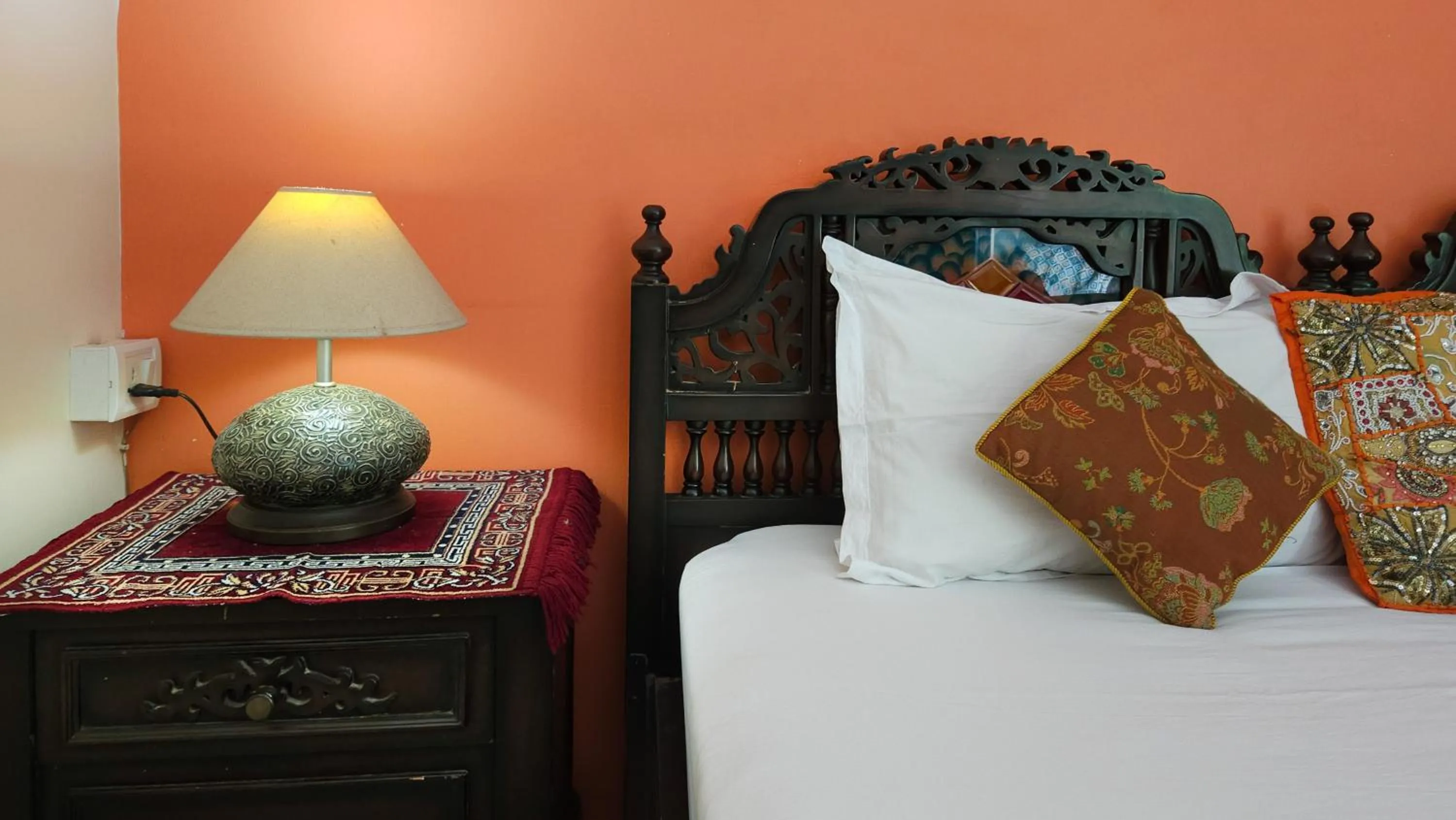 Bed in Prakash Kutir B&B