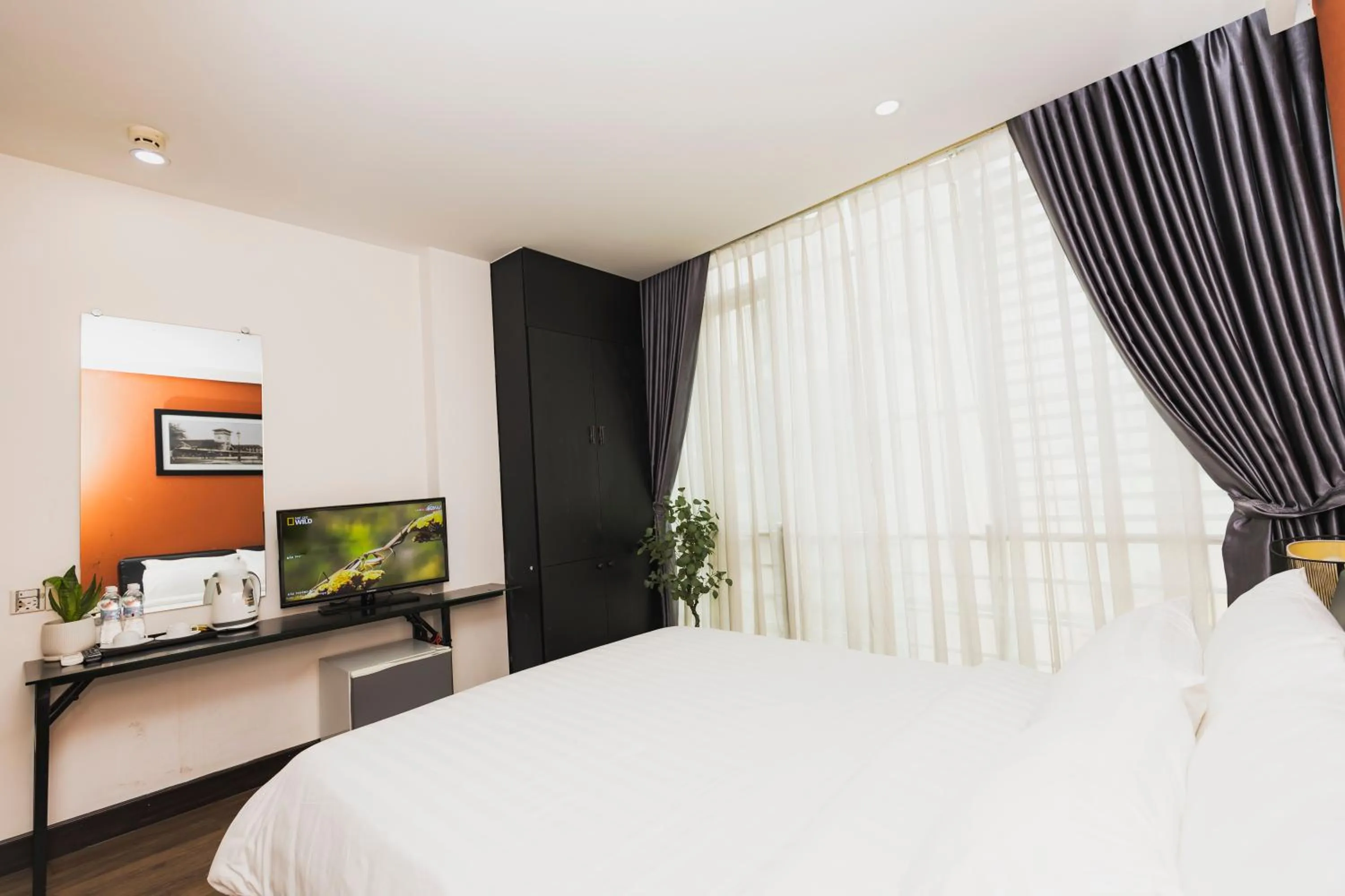 Shower, Bed in The One Premium Hotel