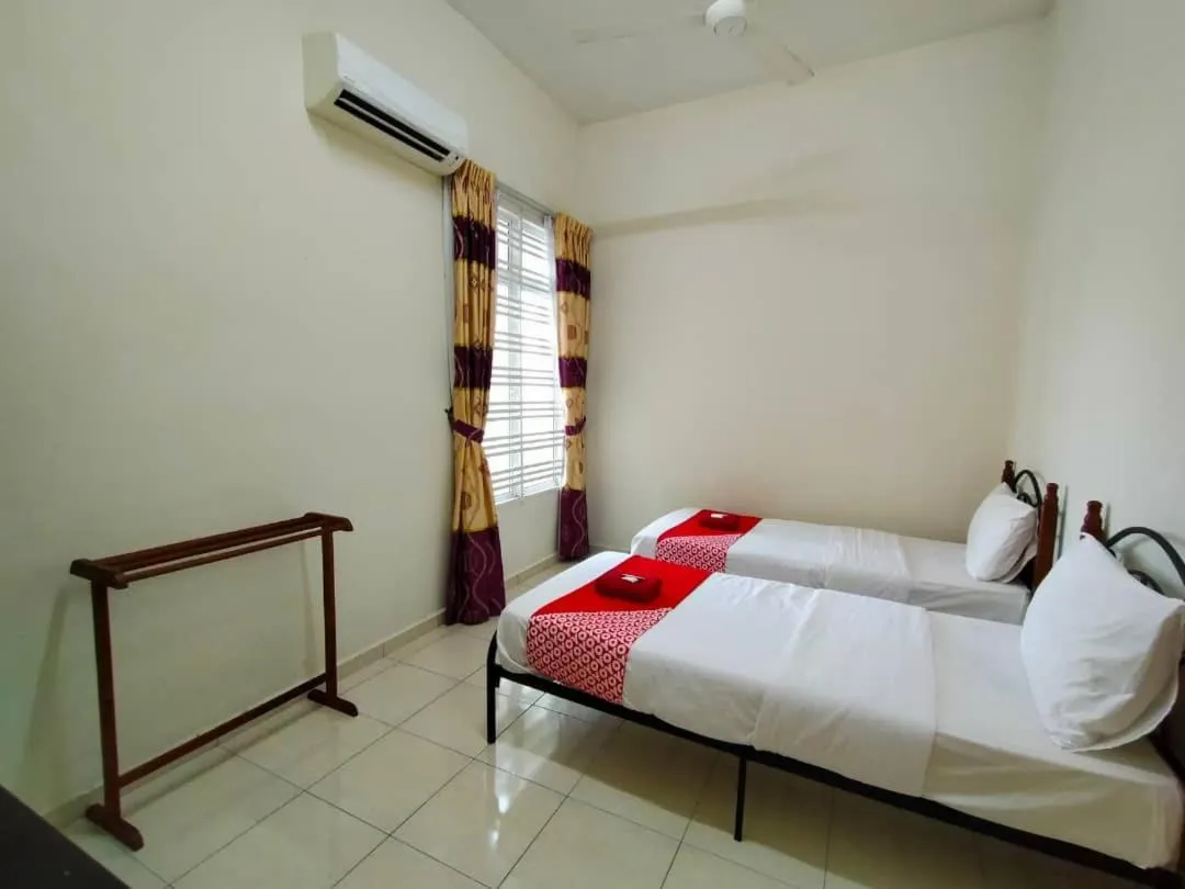 Bed in D' Anjung Inn