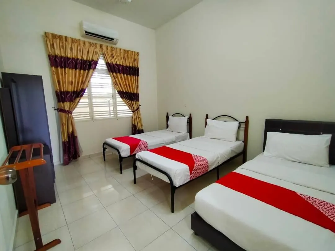 Bed in D' Anjung Inn