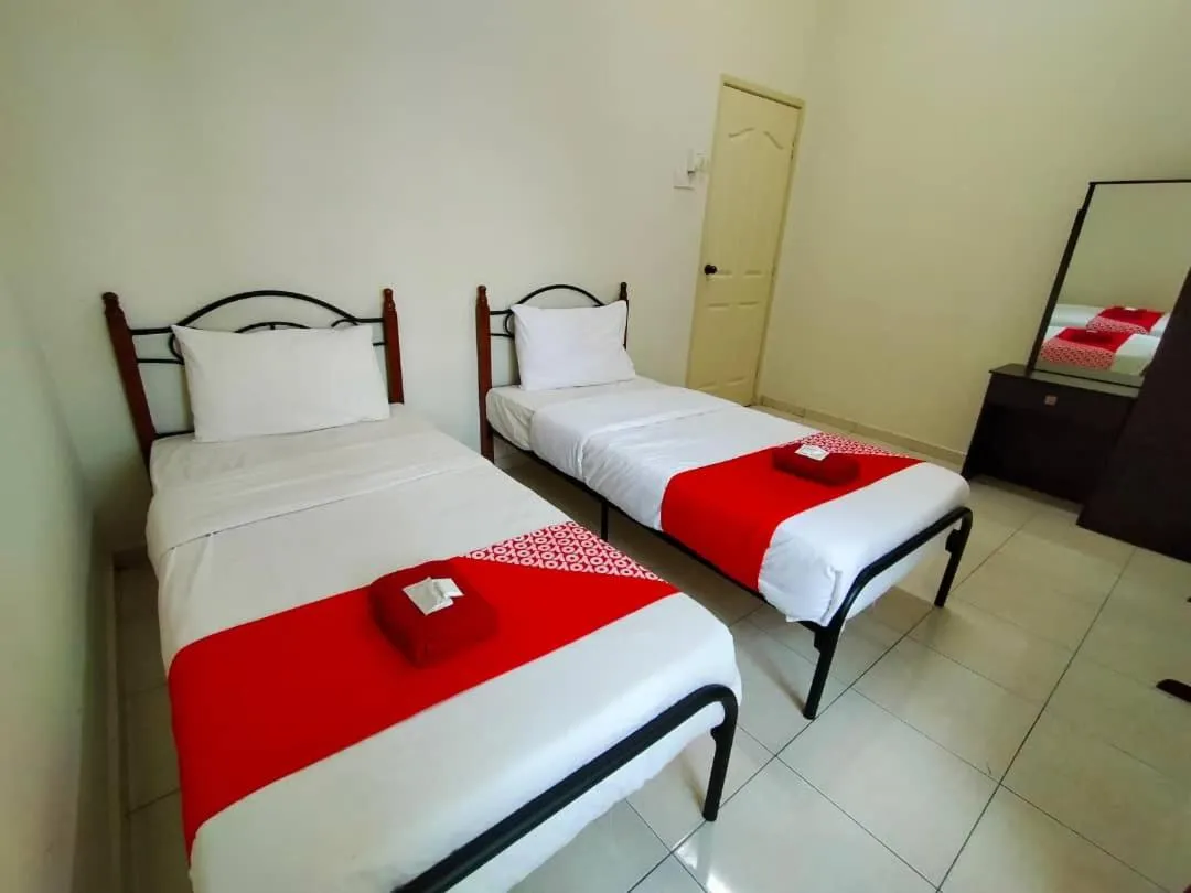 Bed in D' Anjung Inn