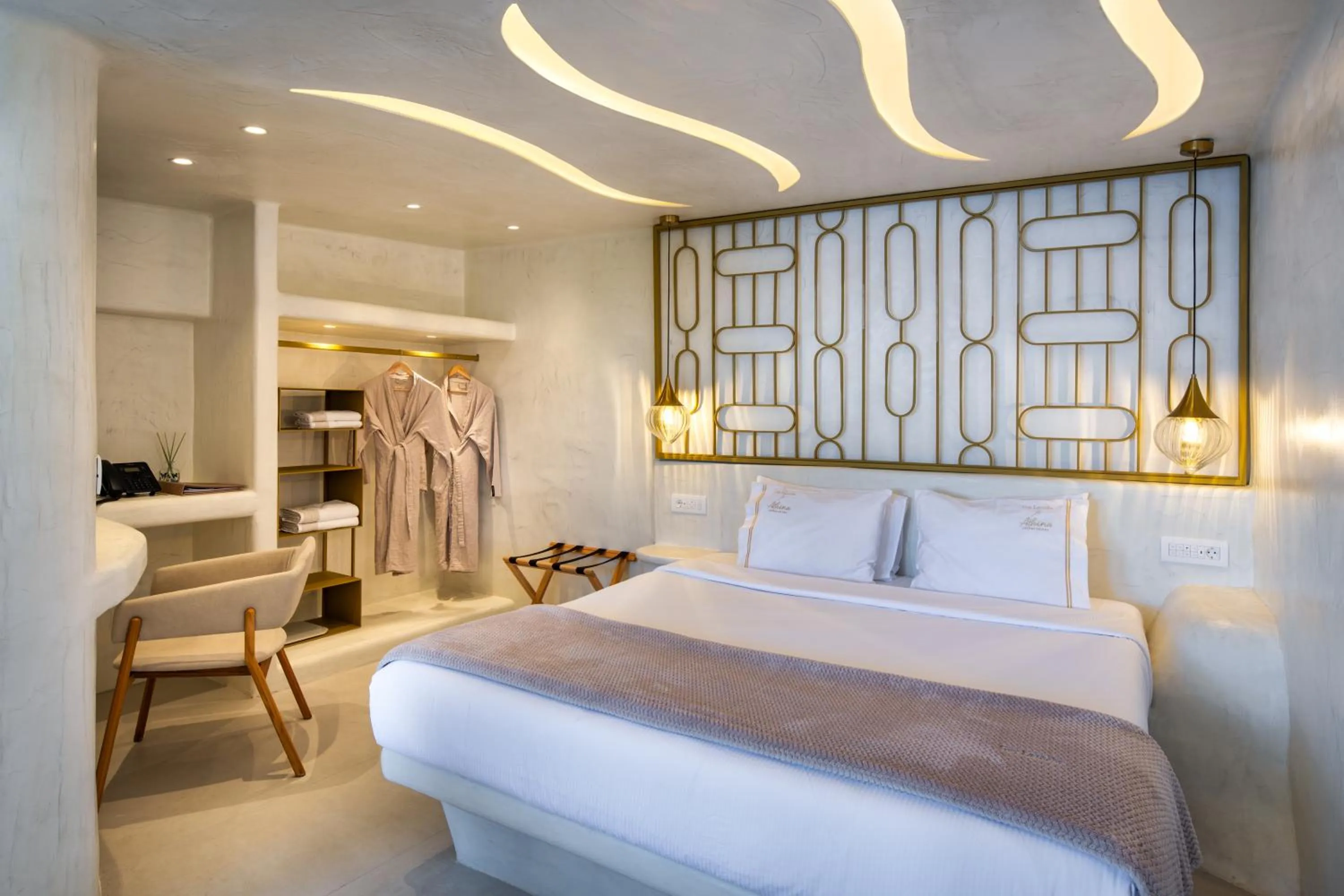 Bedroom in Athina Luxury Suites