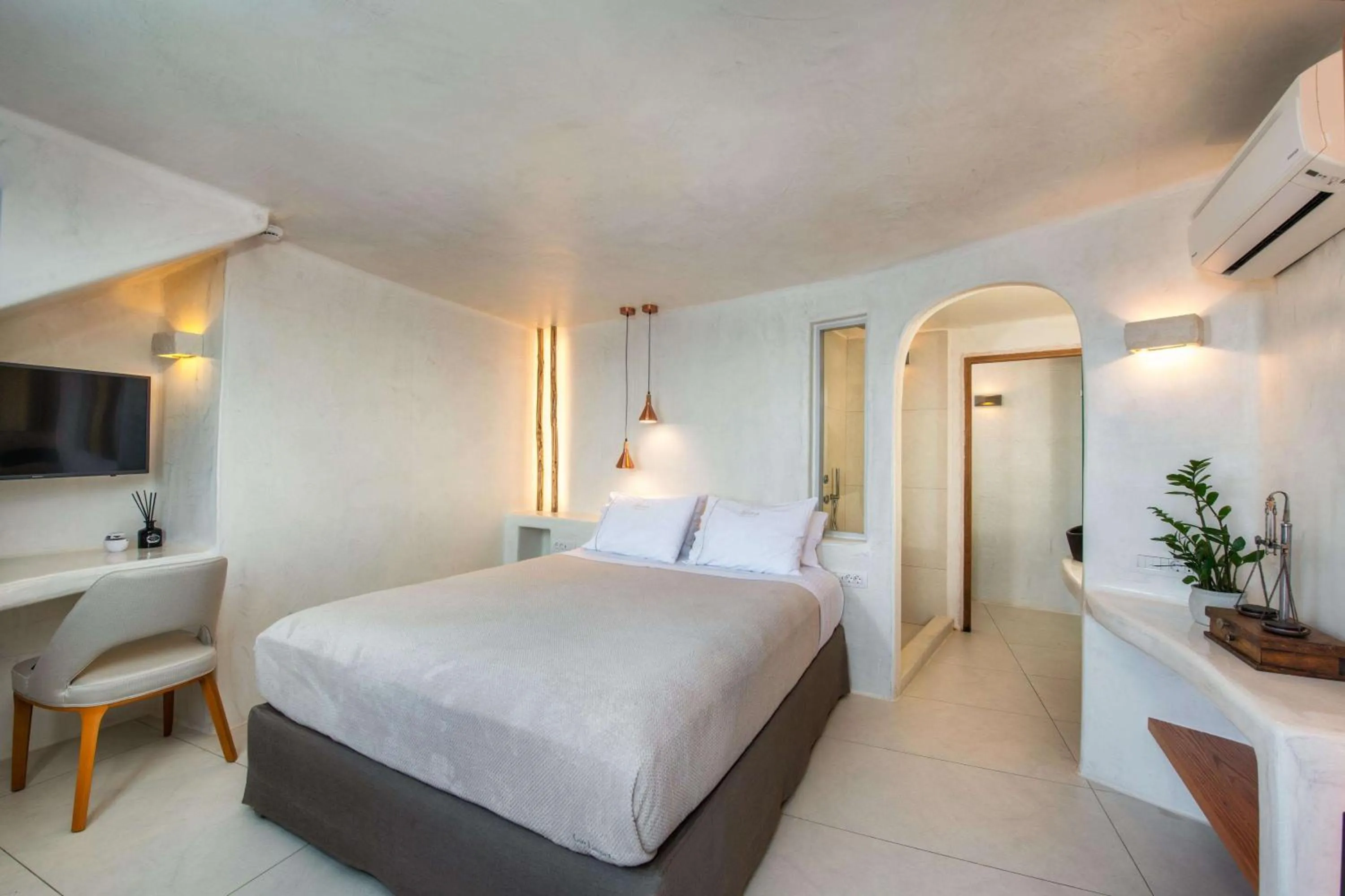 Bedroom in Athina Luxury Suites