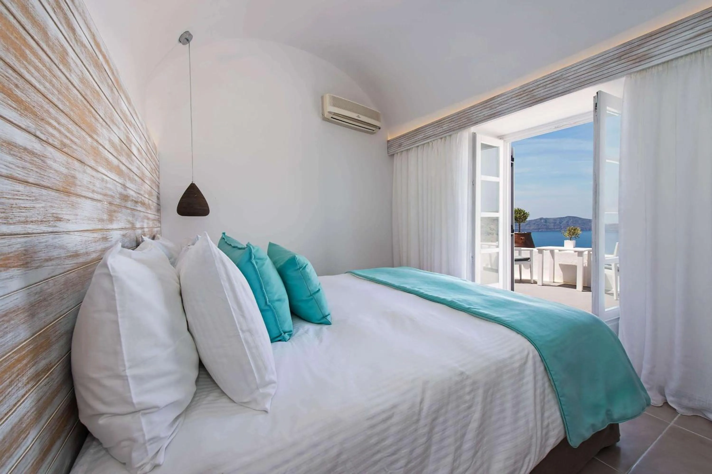 Bedroom in Athina Luxury Suites