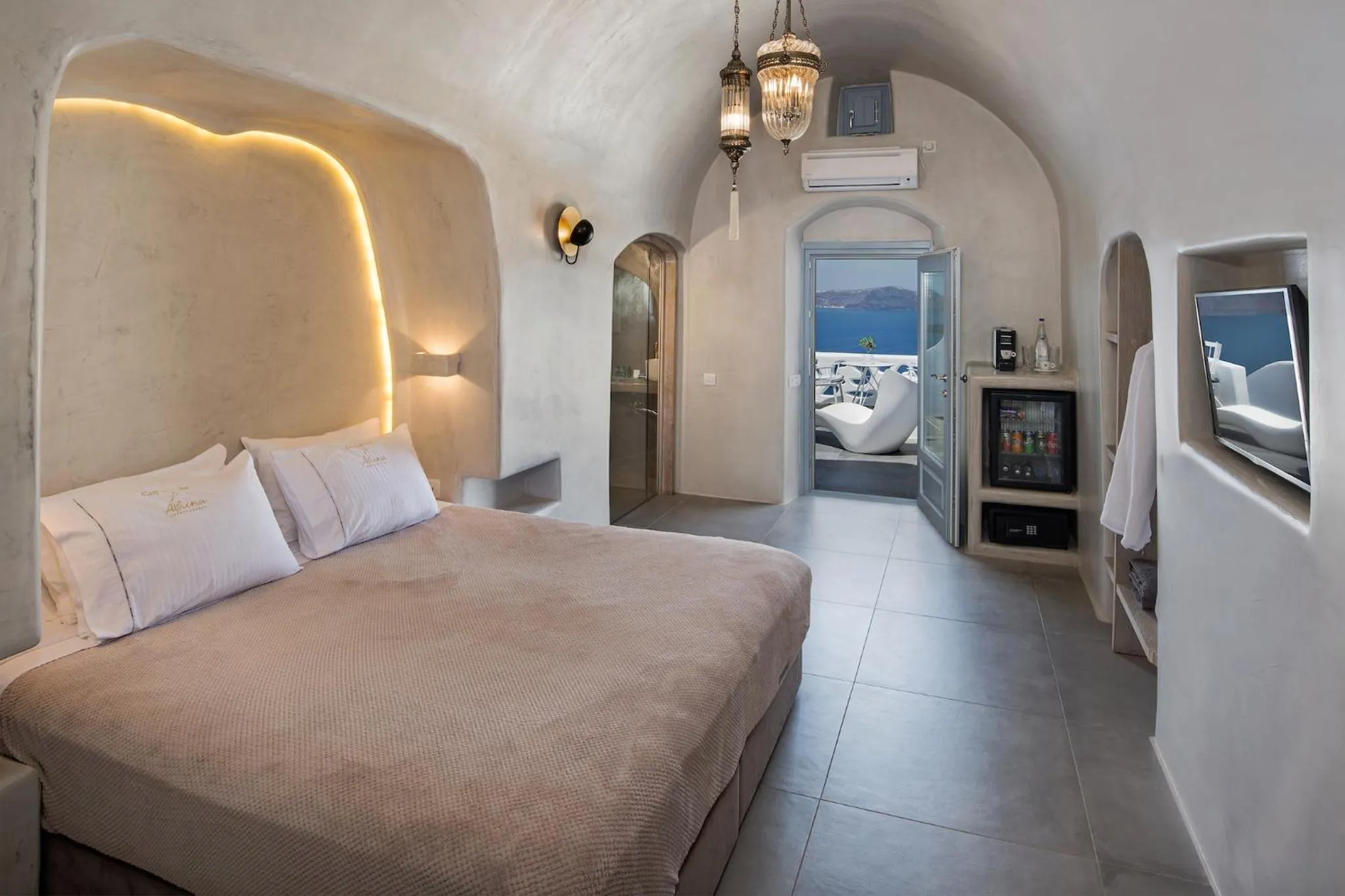 Bed in Athina Luxury Suites