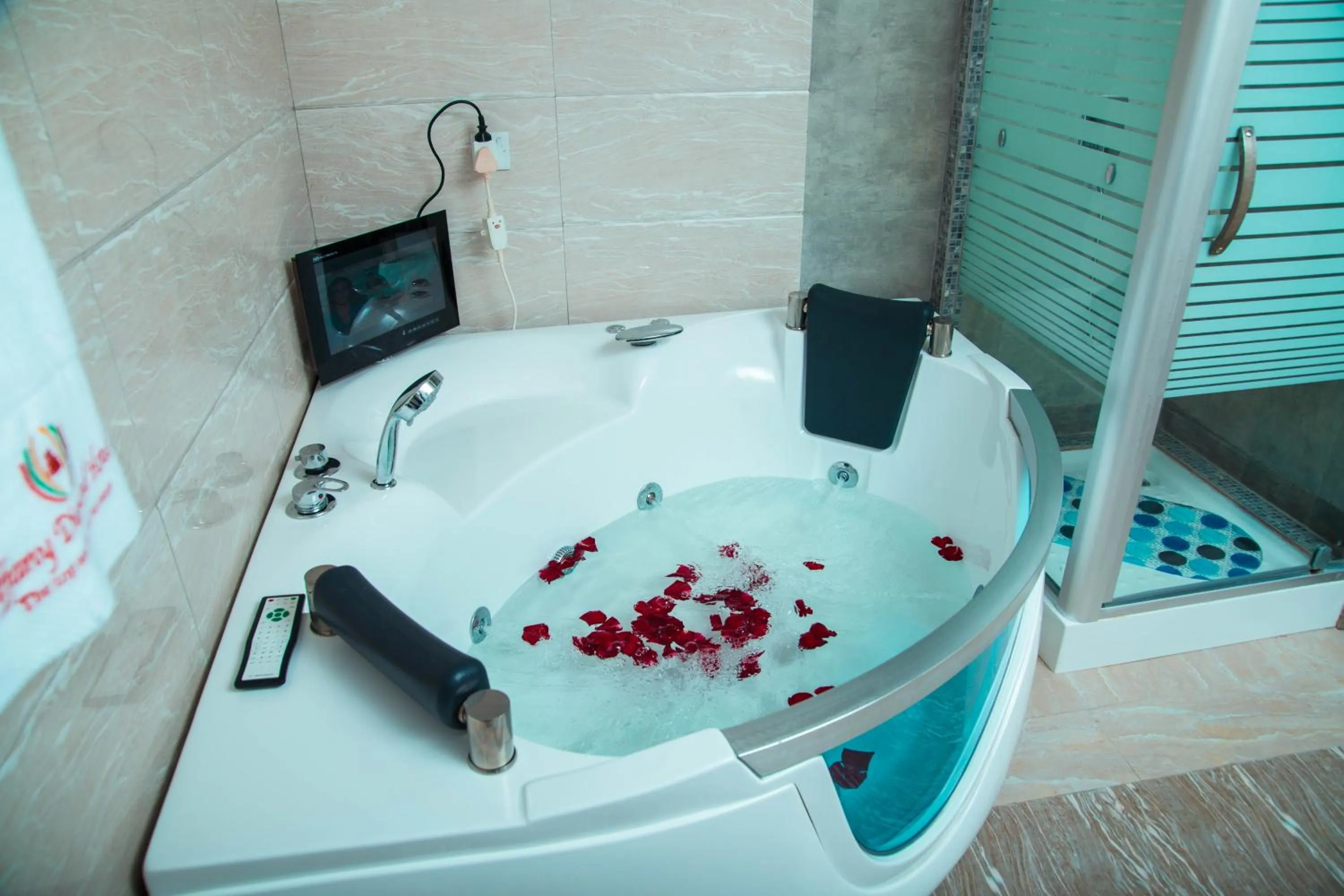 Bathroom in Tiffany Diamond Hotels LTD - Makunganya