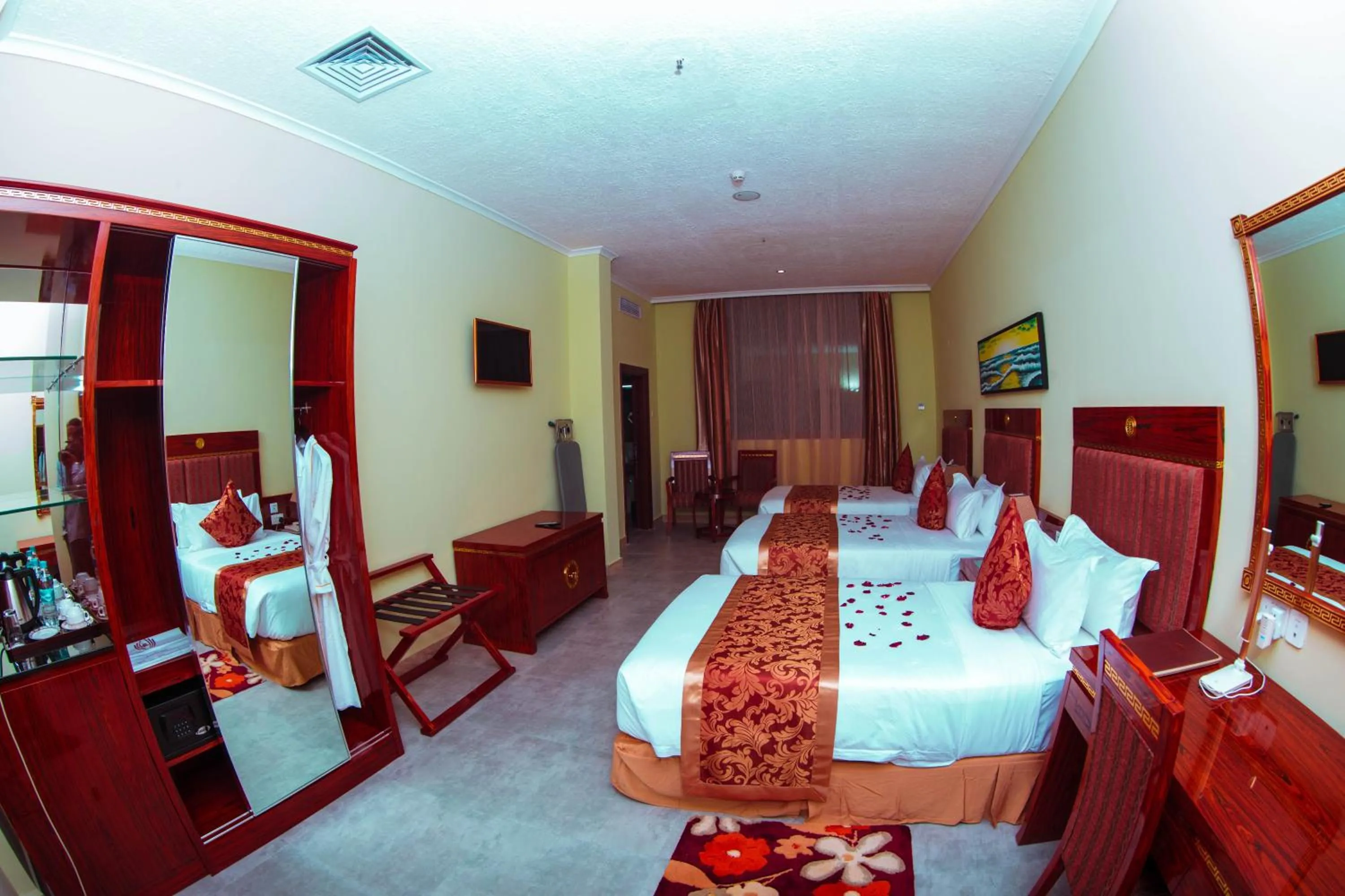 Photo of the whole room, Bed in Tiffany Diamond Hotels LTD - Makunganya