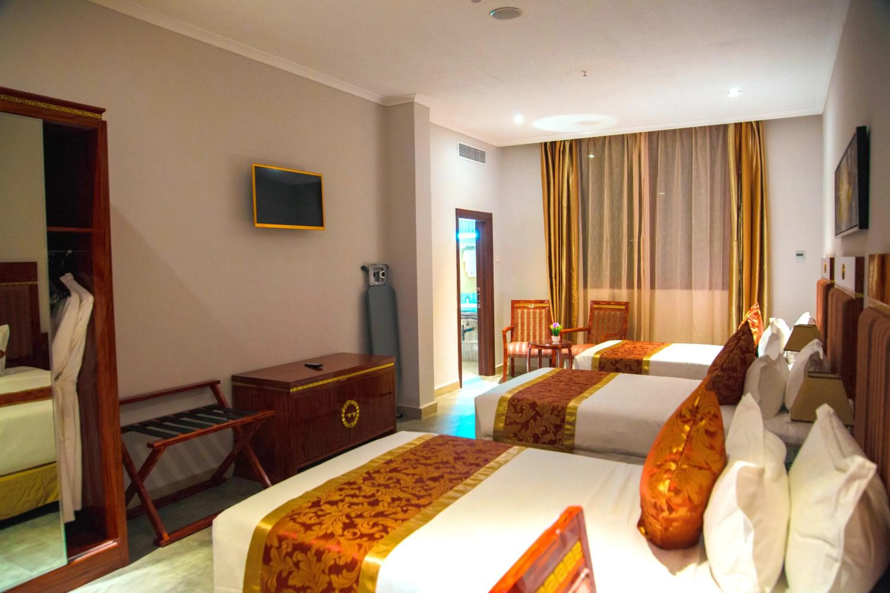 Bedroom, Bed in Tiffany Diamond Hotels LTD - Makunganya