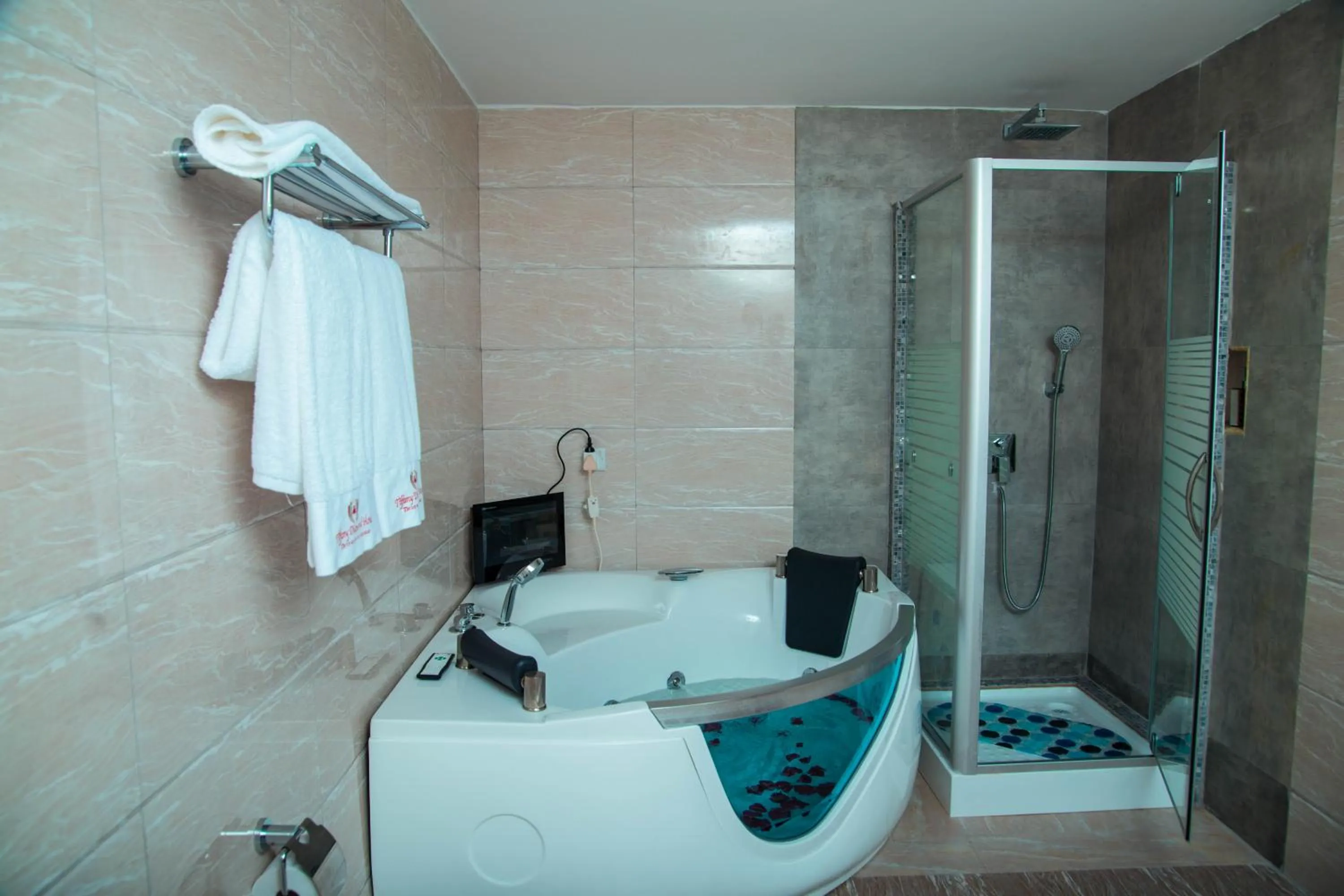 Bathroom in Tiffany Diamond Hotels LTD - Makunganya