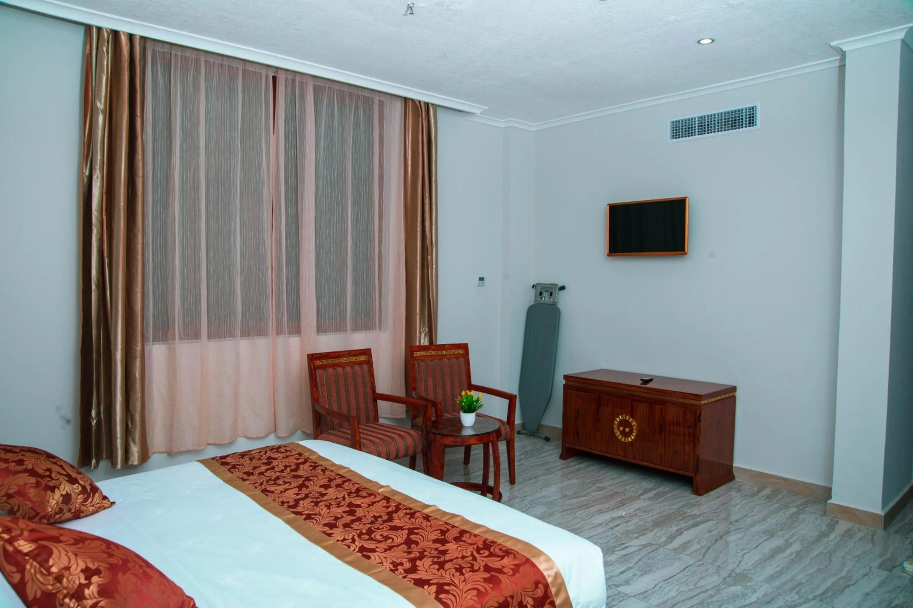 Bed in Tiffany Diamond Hotels LTD - Makunganya