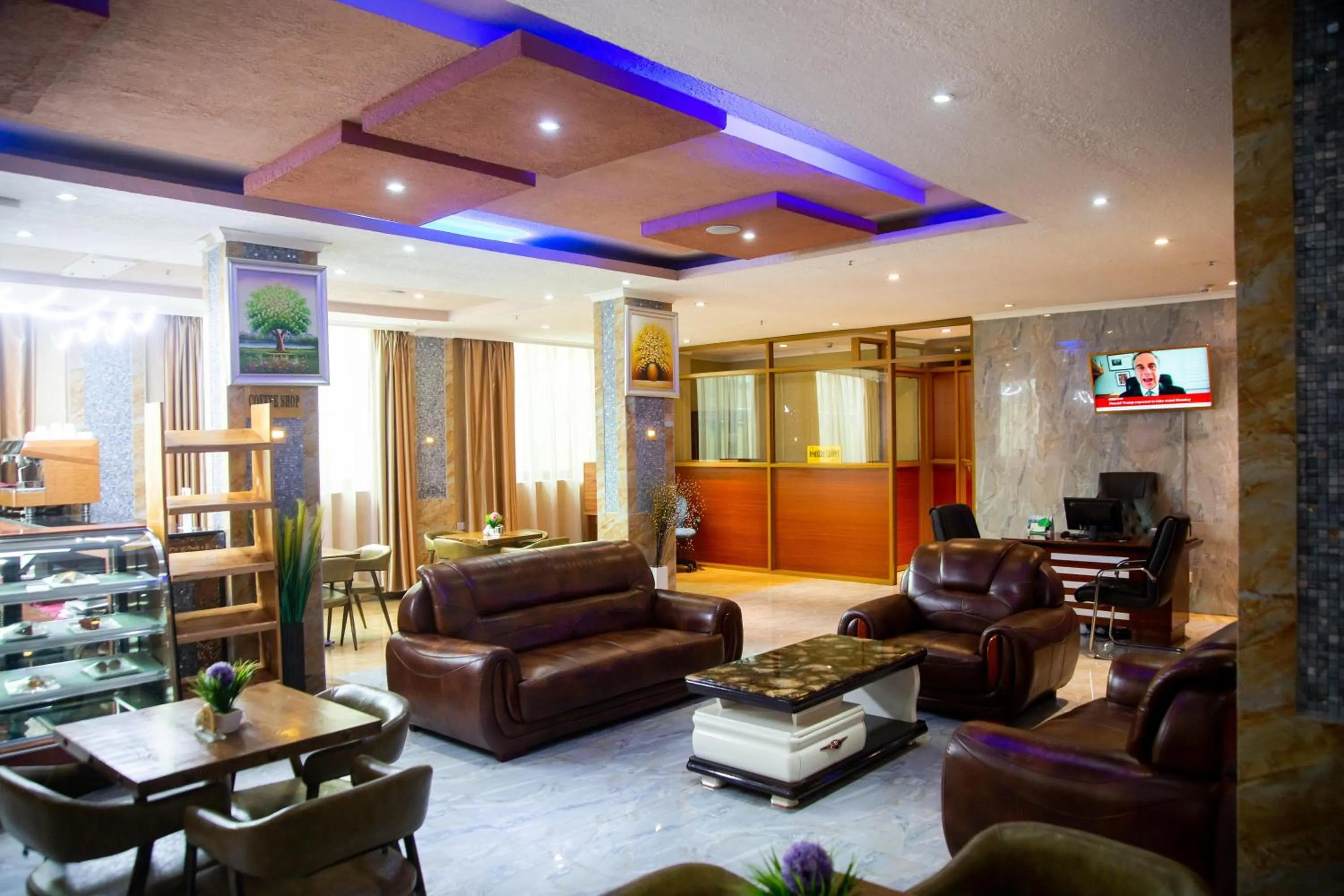 Communal lounge/ TV room in Tiffany Diamond Hotels LTD - Makunganya