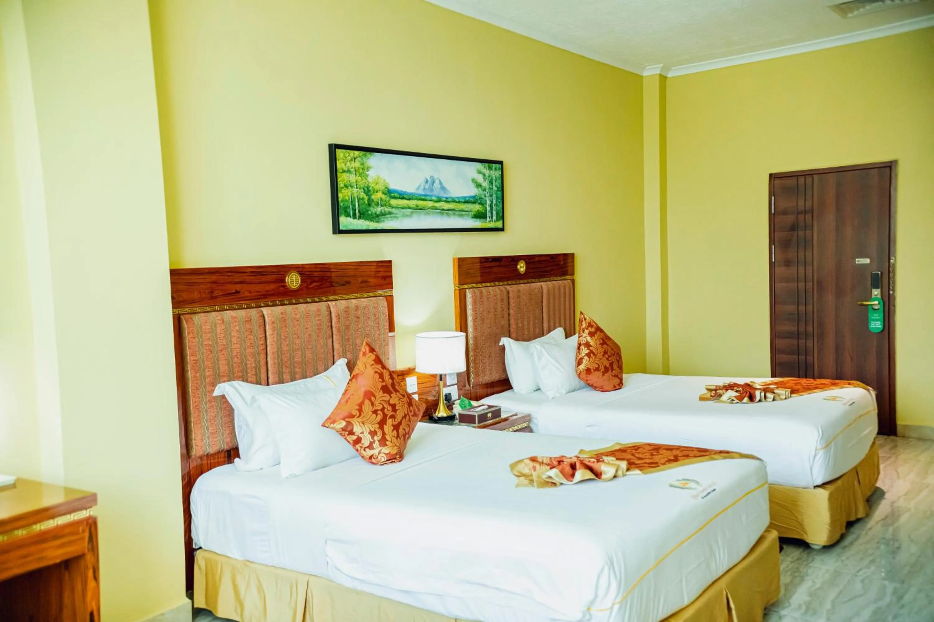 Bed in Tiffany Diamond Hotels LTD - Makunganya