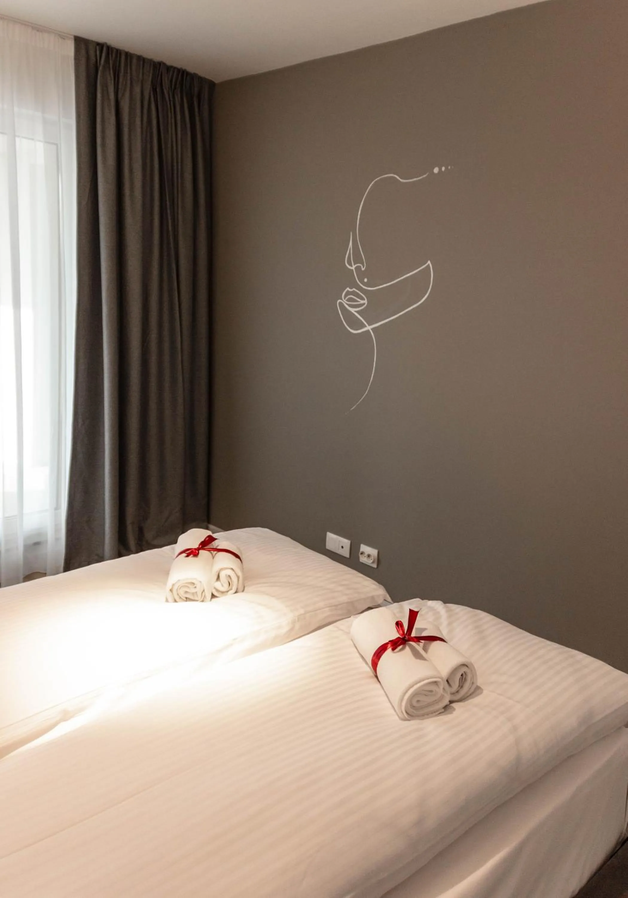 Bed in Ares ApartHotel