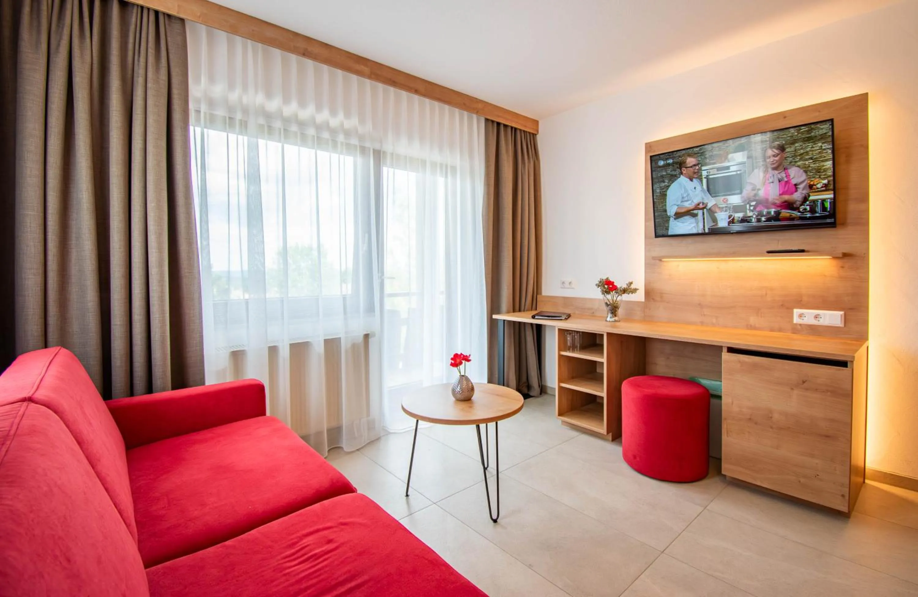 Communal lounge/ TV room in Wellnesshotel Hohenrodt