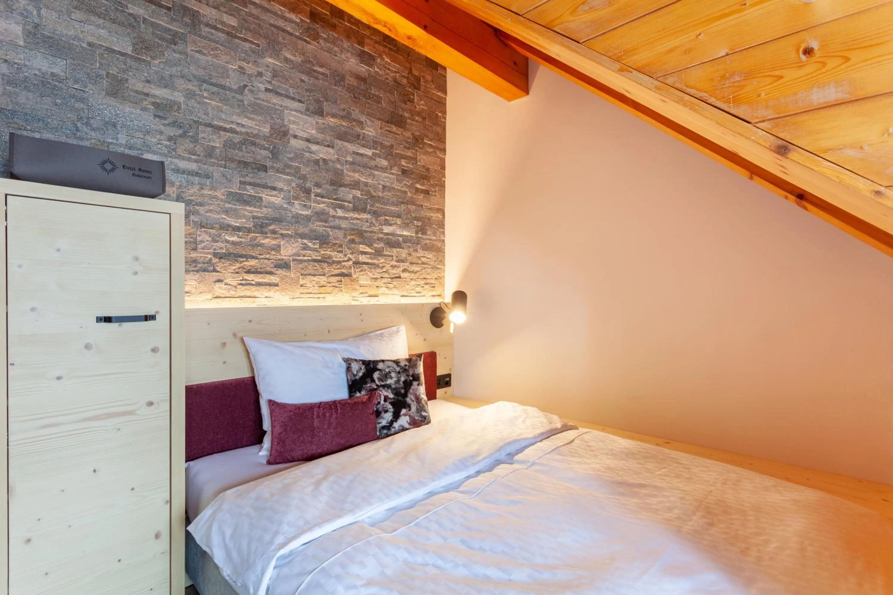 Bed in Sonne Andermatt Swiss Quality Hotel