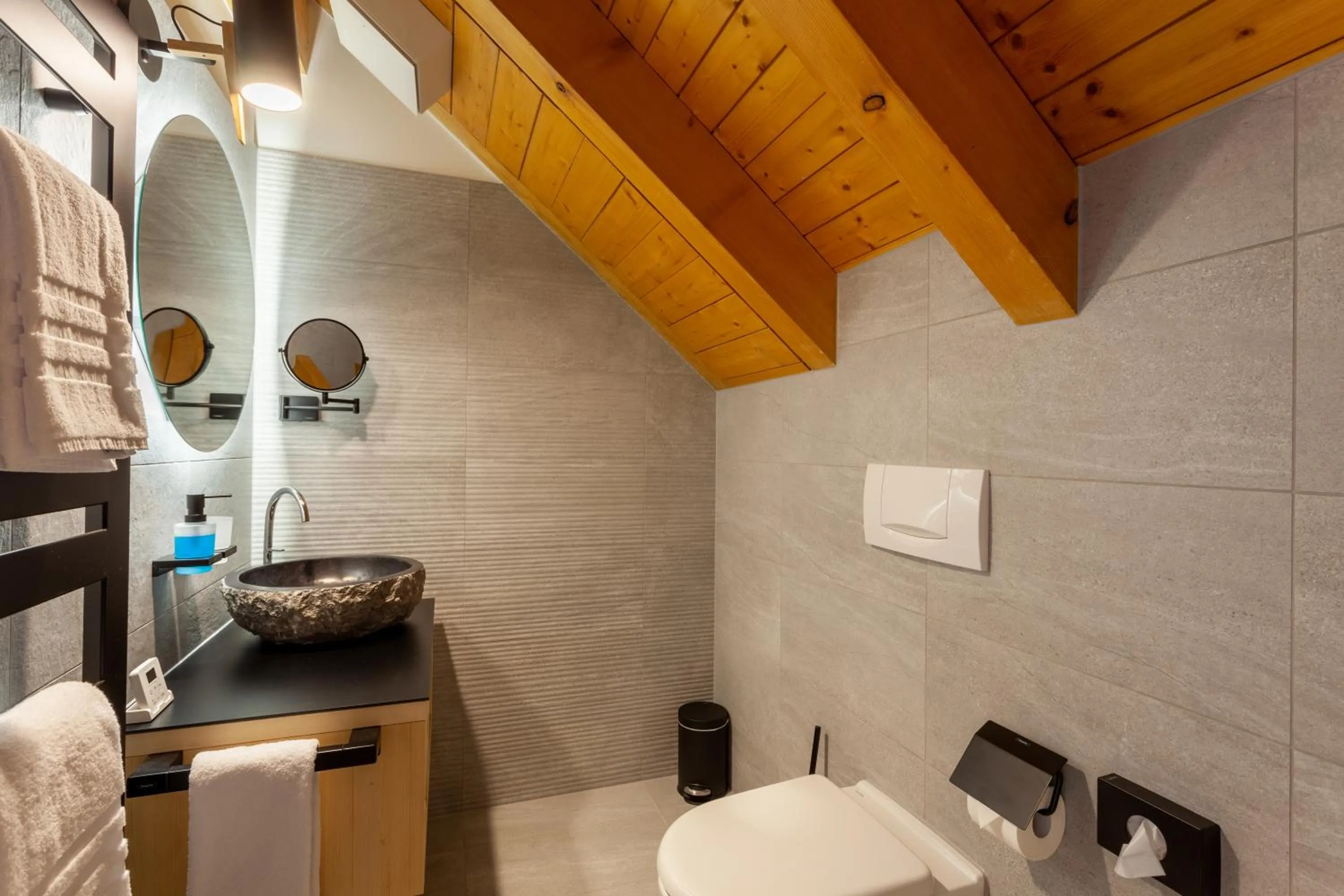 Bathroom in Sonne Andermatt Swiss Quality Hotel