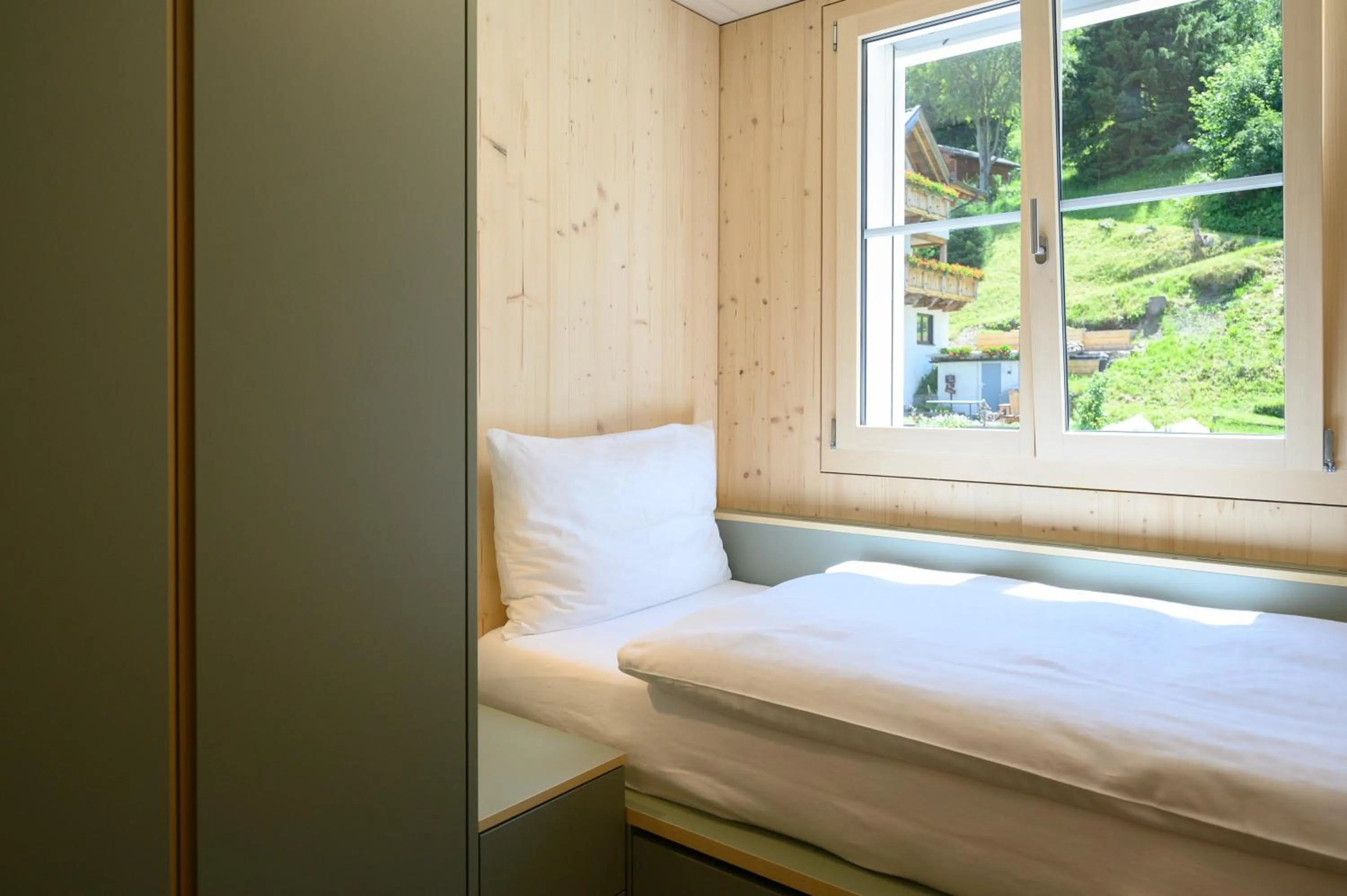 Bed in Sonne Andermatt Swiss Quality Hotel