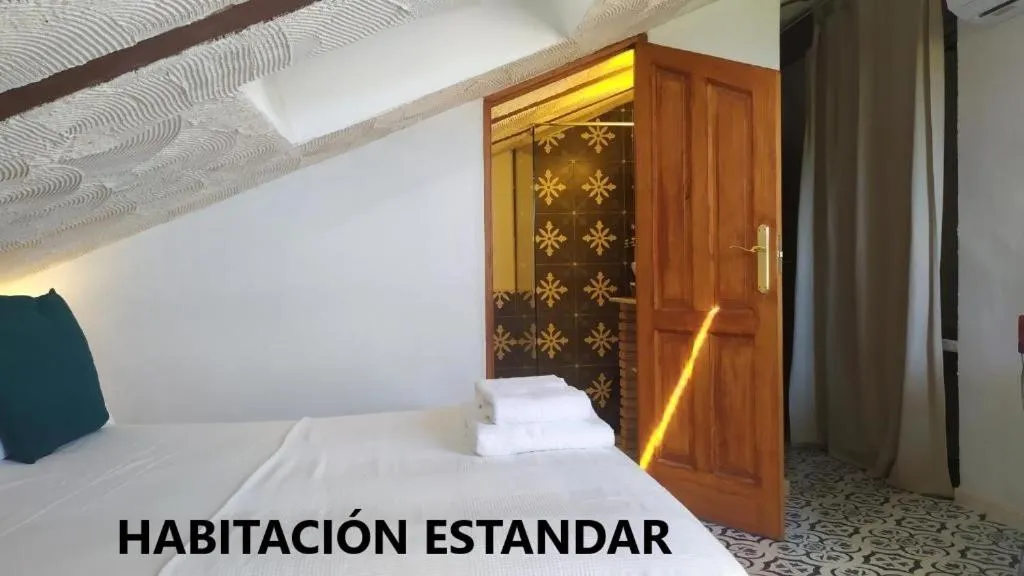 Bed in Alojamientos La Casa de Piedra