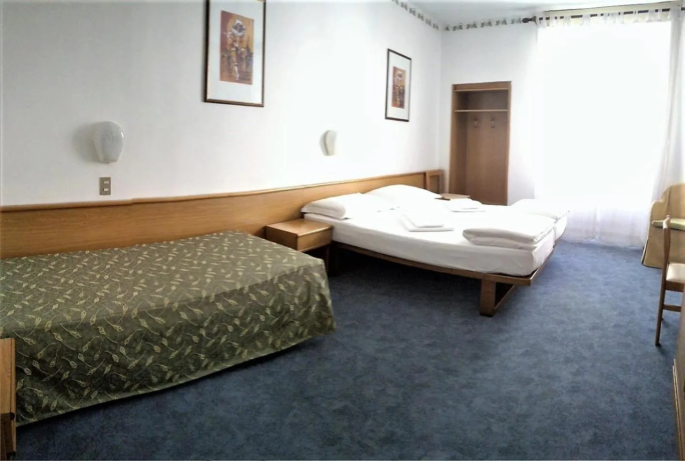Photo of the whole room, Bed in Hotel Modena old town