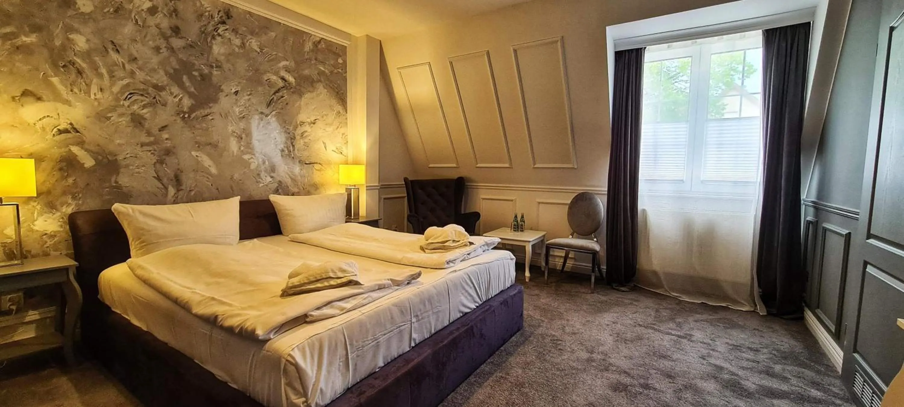 Bed in Monte Carlo Boutique Hotel