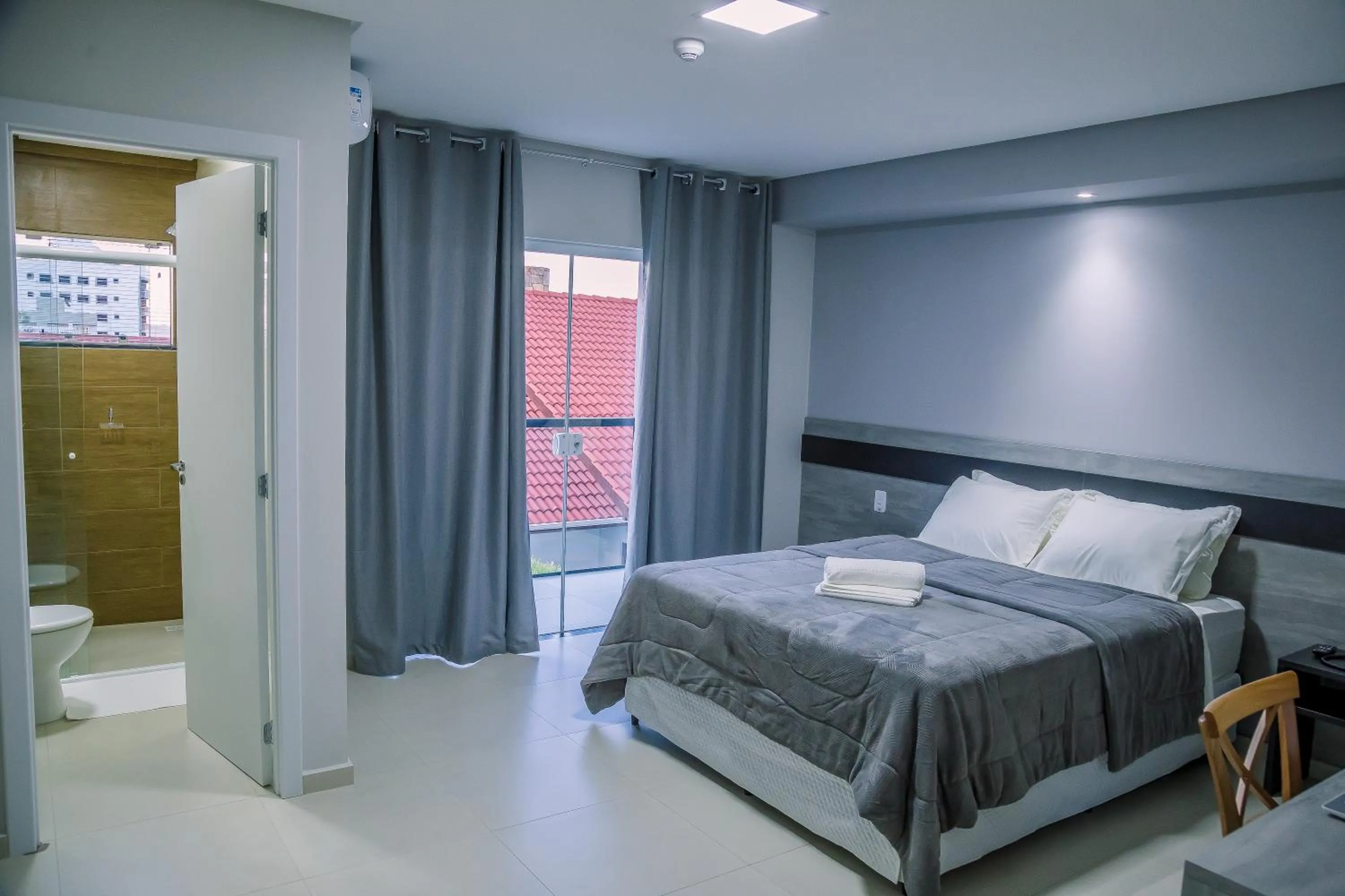 Bed in Hotel Prime Executive