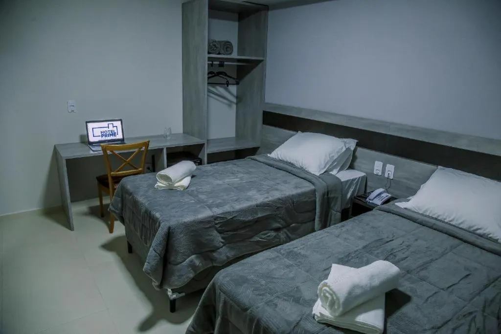 Bed in Hotel Prime Executive