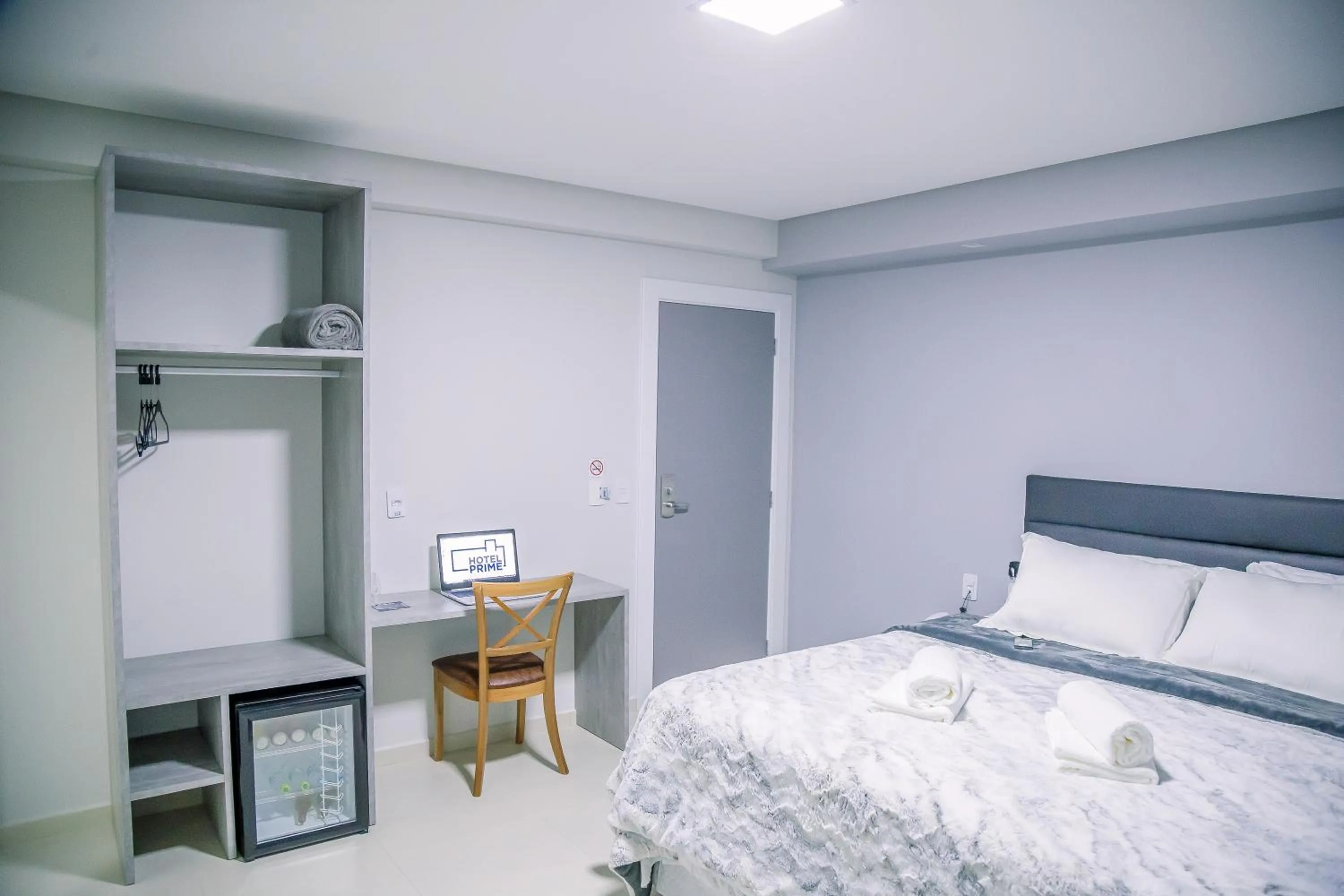 Bed in Hotel Prime Executive