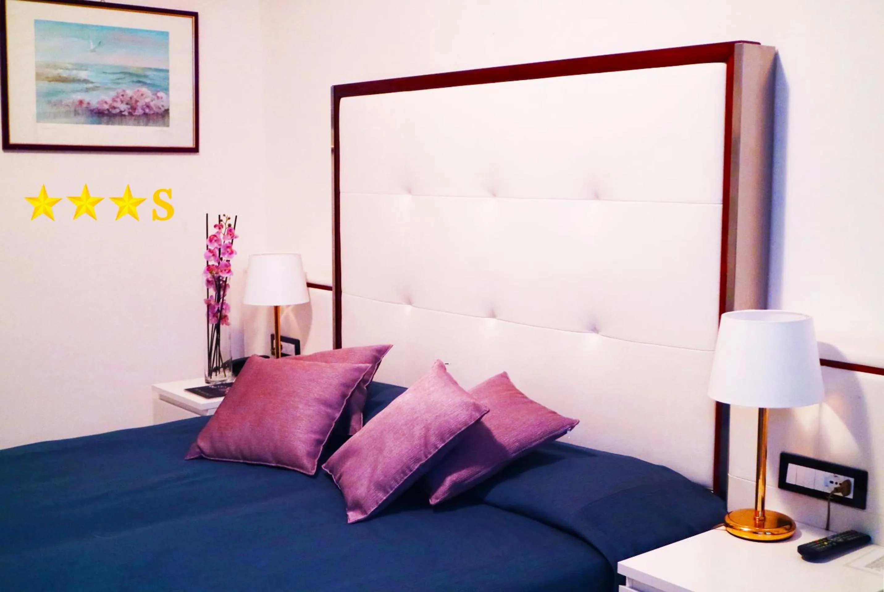 Bed in Hotel Rossini 4S